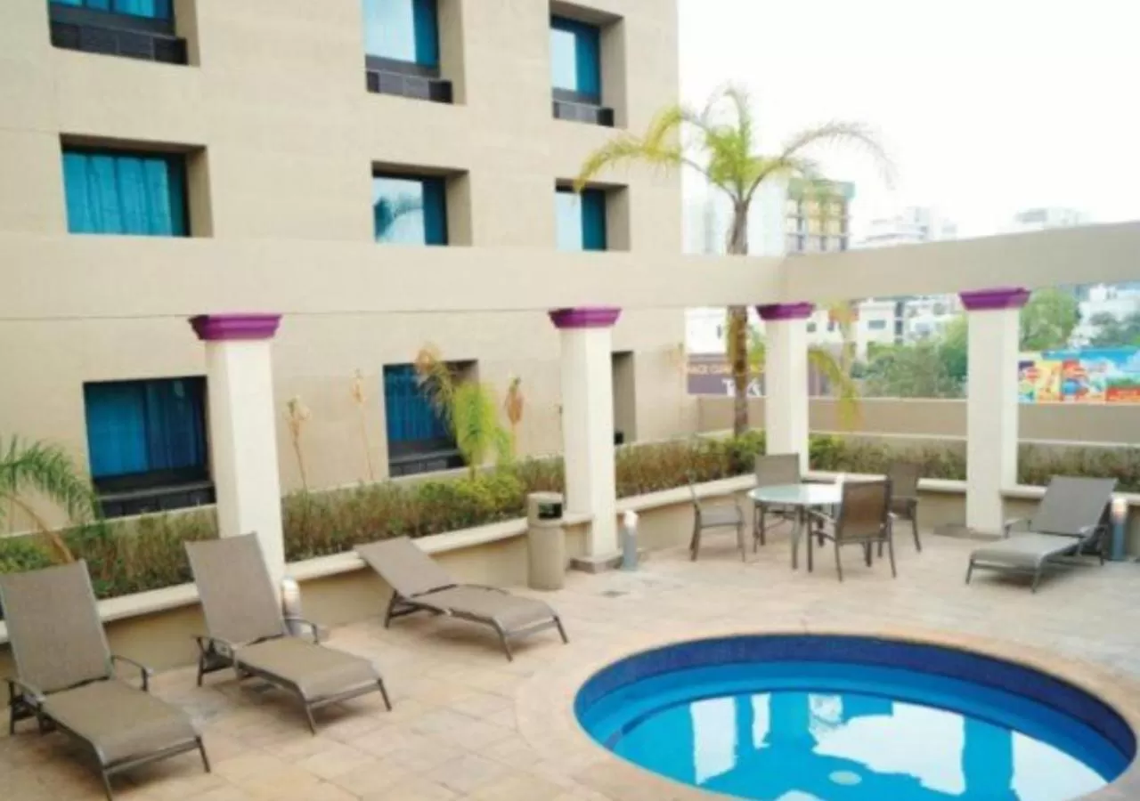 Swimming pool in CHN Hotel Monterrey Centro, Trademark Collection by Wyndham