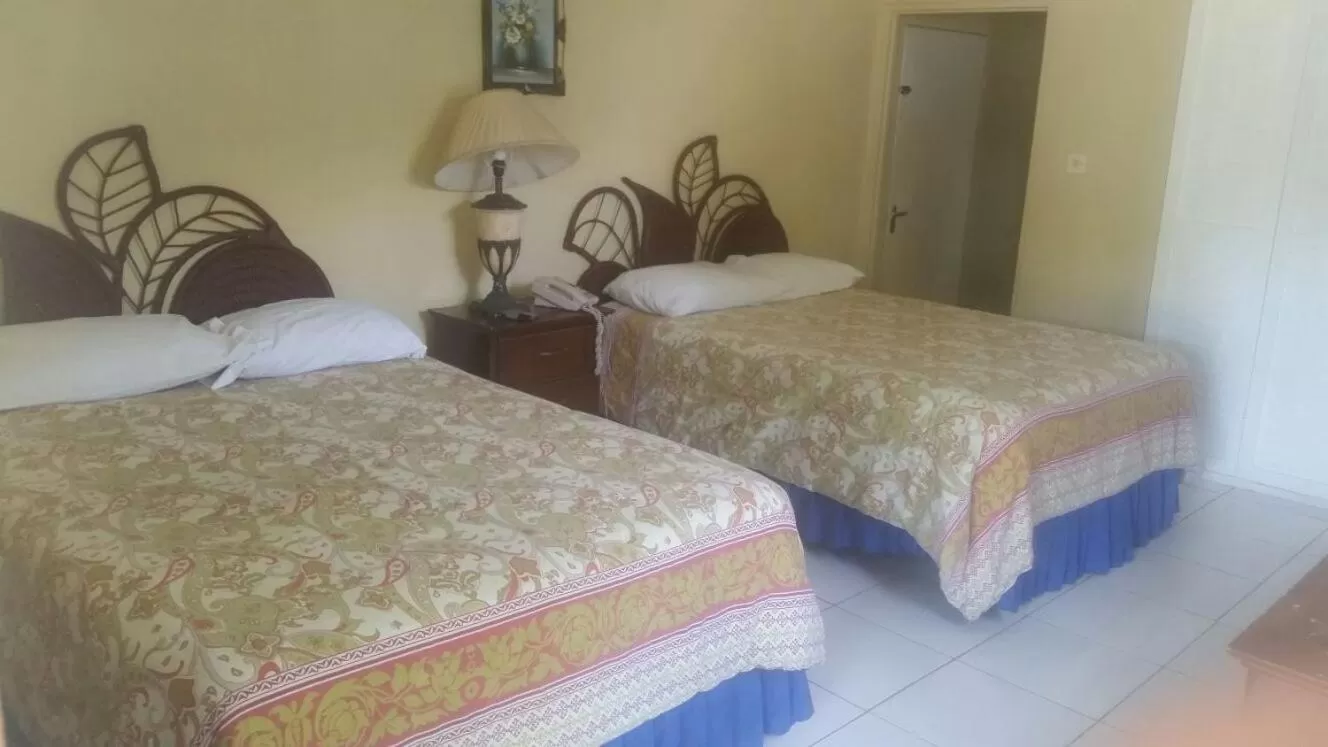 Bed in Negril Beach Club Condos