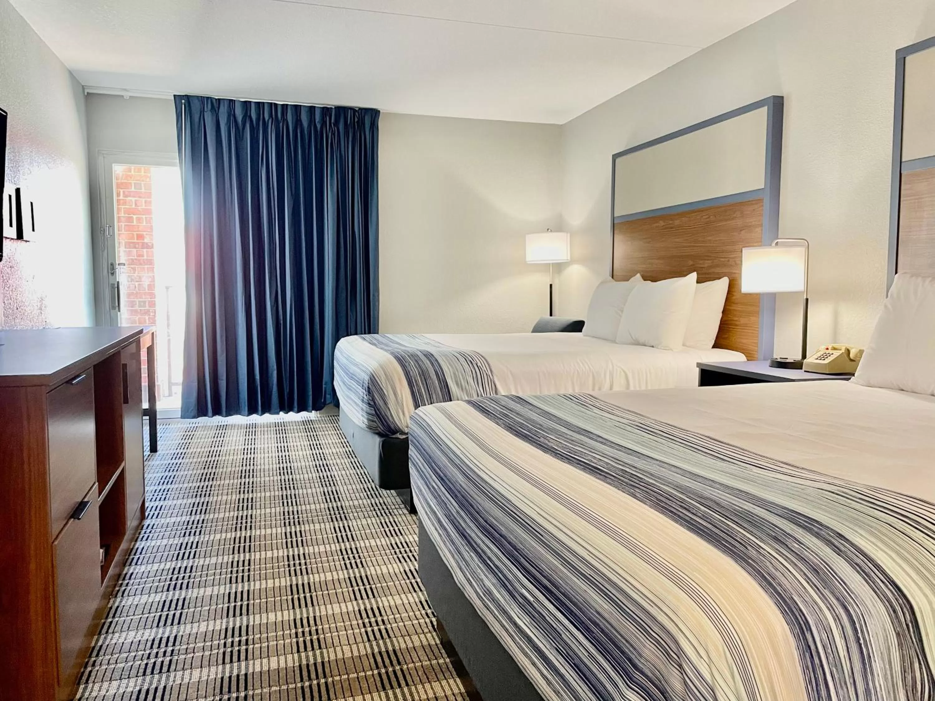 Bedroom, Bed in AmericInn by Wyndham Branson & Conference Center