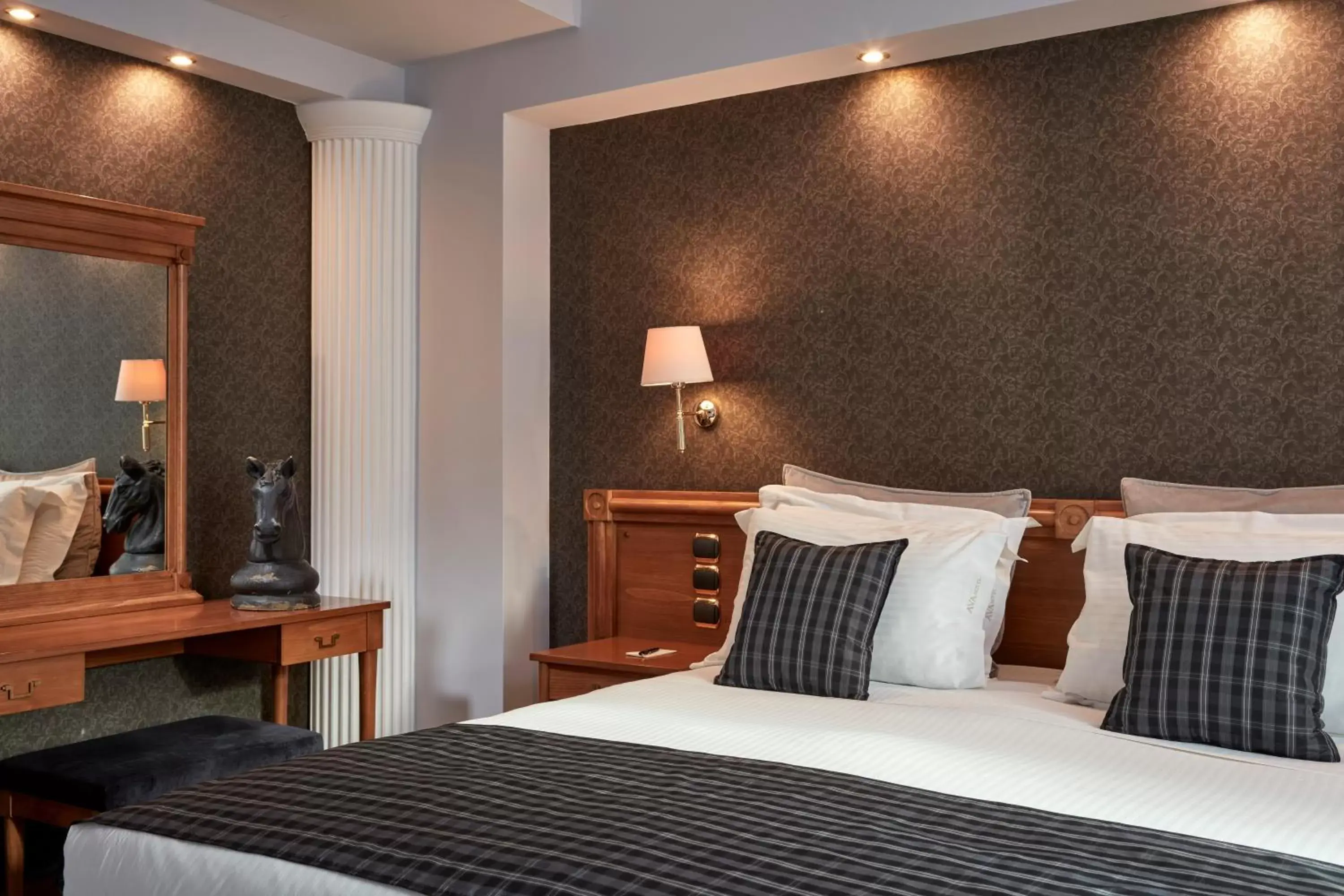 Bed in Ava Hotel and Suites Bed in Ava Hotel and Suites