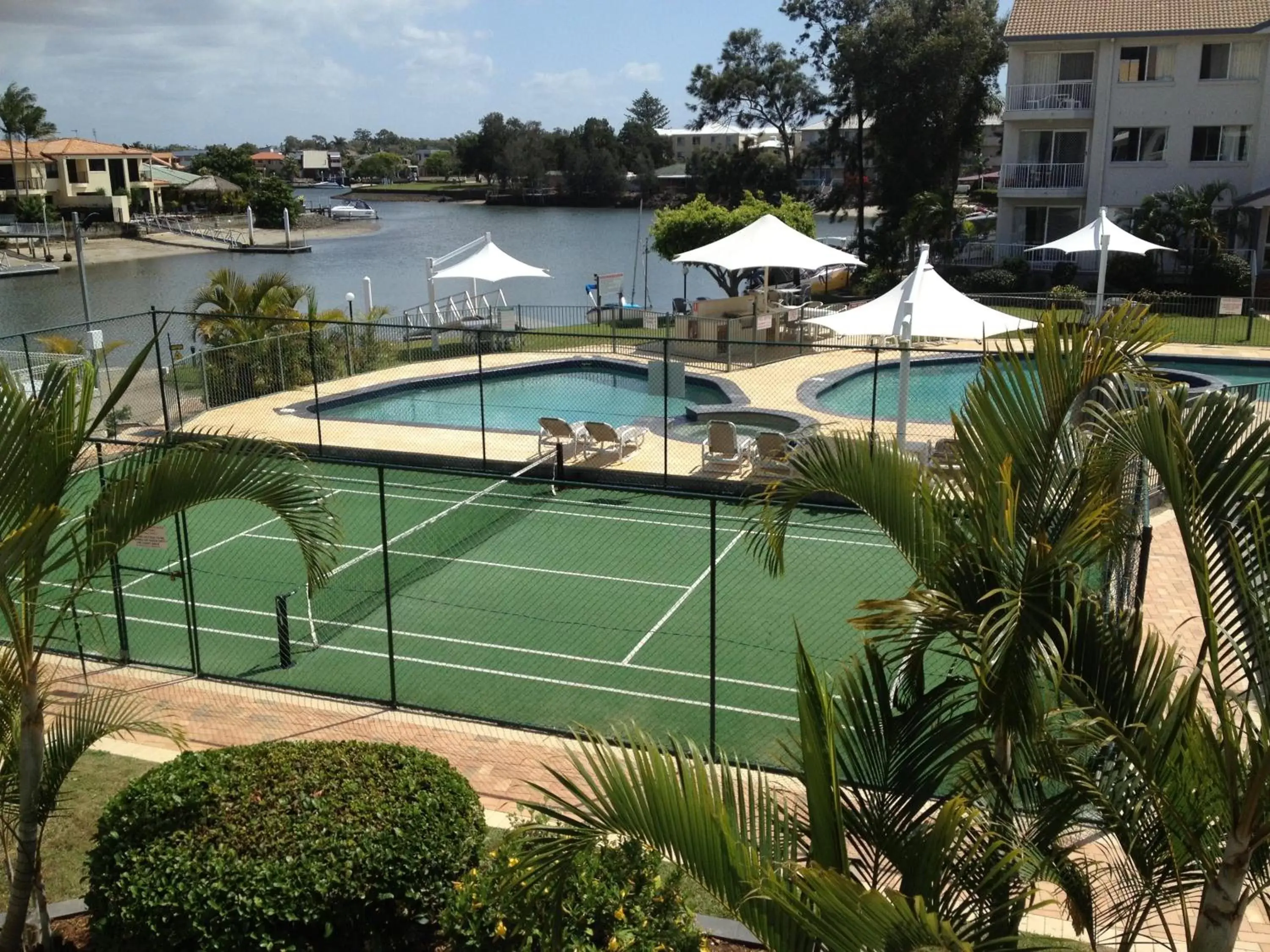 BBQ facilities, Pool View in Pelican Cove Apartments