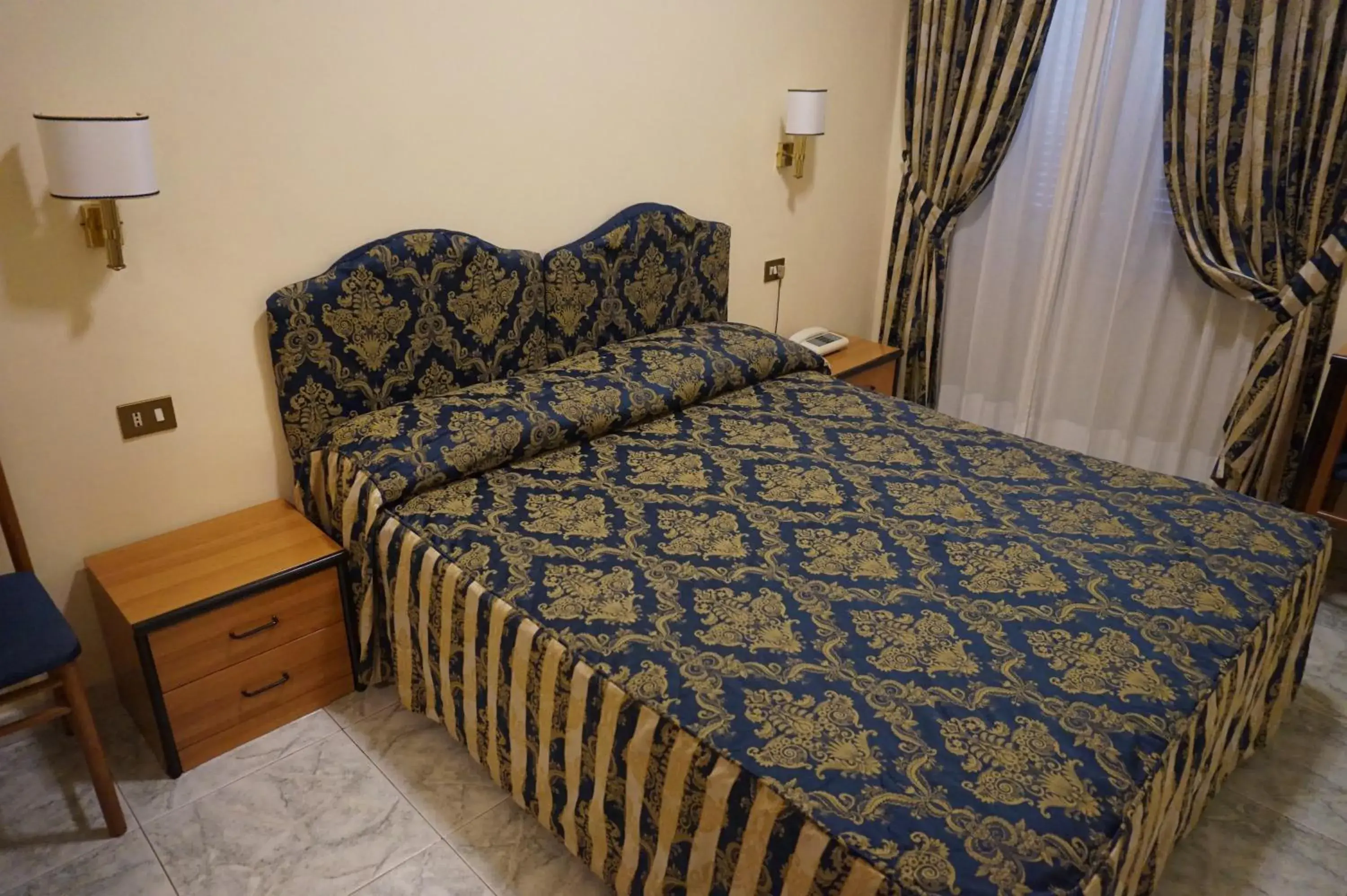 Bed in Hotel Mariano Bed in Hotel Mariano