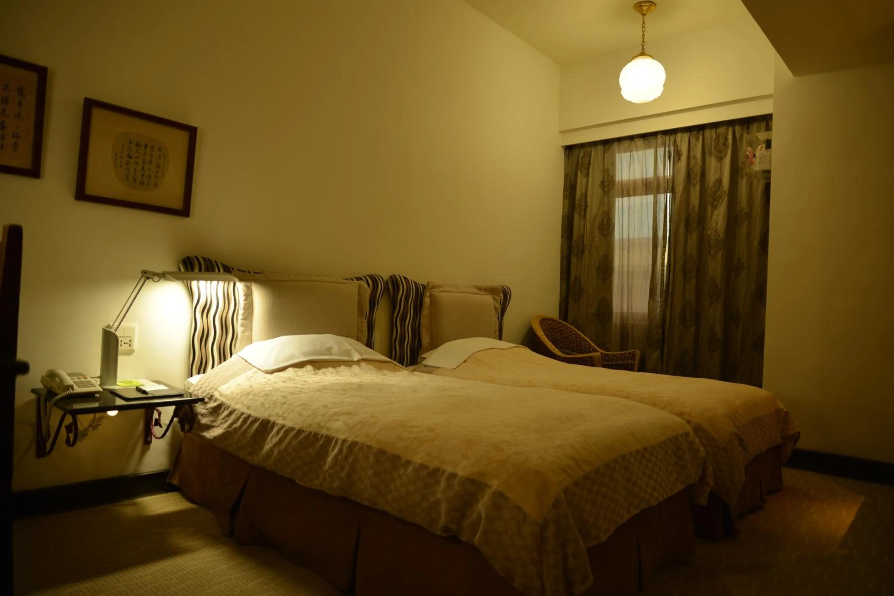 Bed in Kingship Hotel Kaohsiung Inter Continental