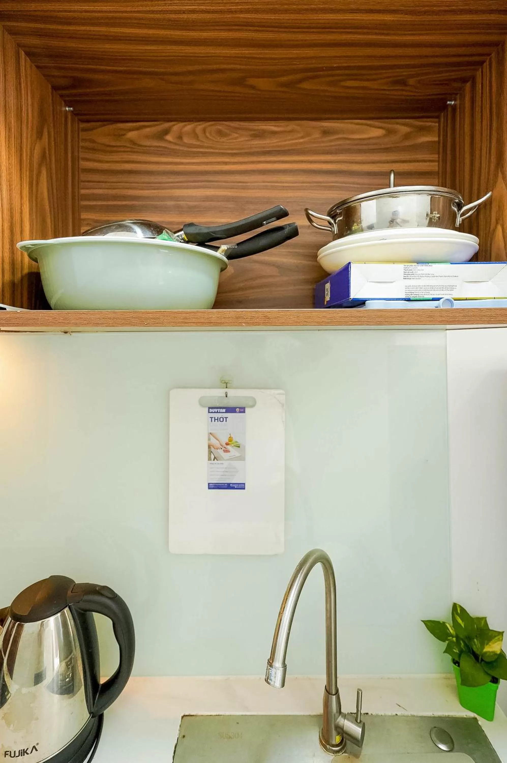 Kitchen or kitchenette in Spring Hill Apartment -The High Class