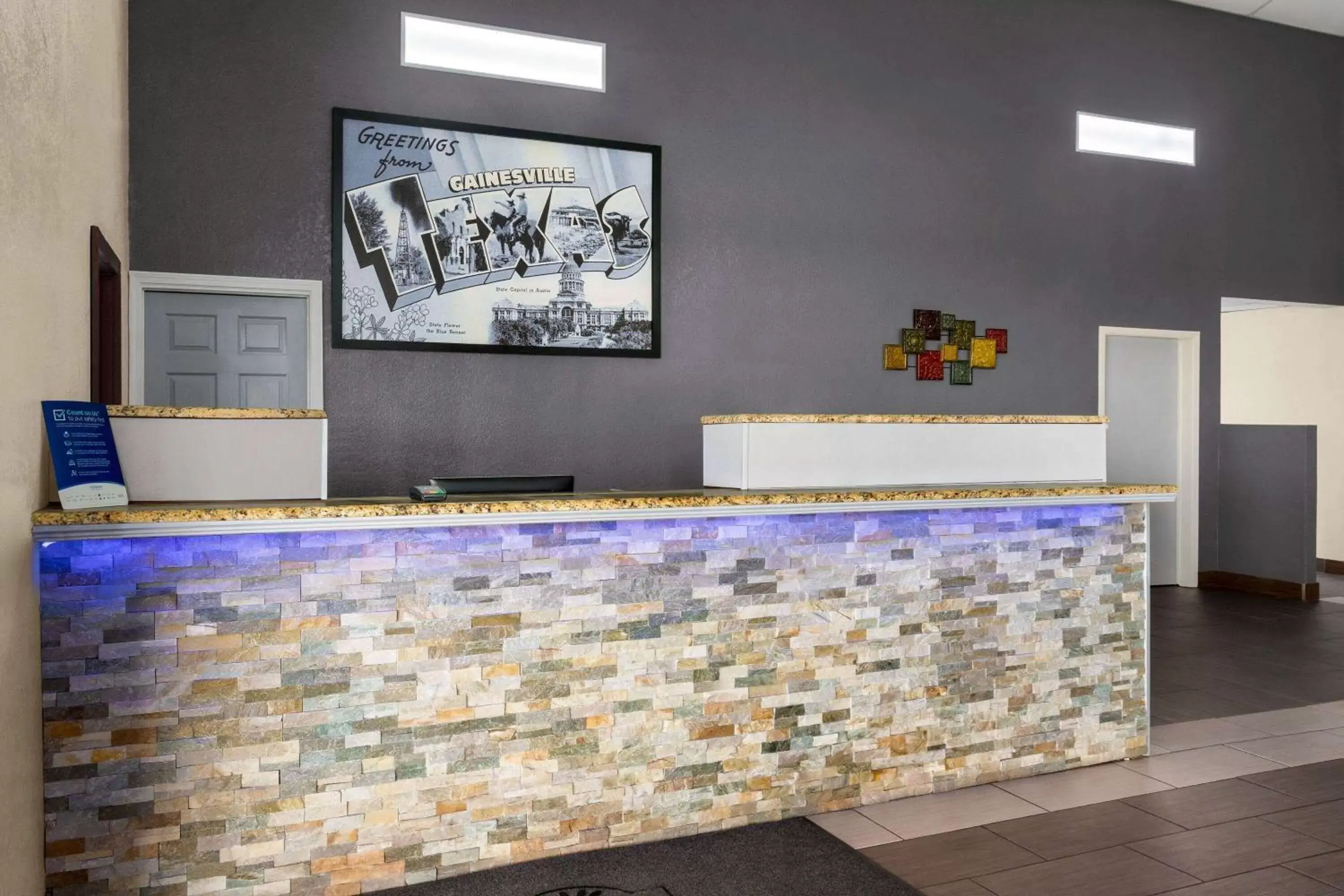 Lobby or reception in Super 8 by Wyndham Gainesville TX Lobby or reception in Super 8 by Wyndham Gainesville TX