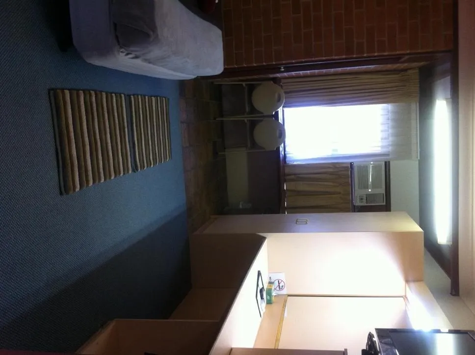 Day, Bed in Elsinor Motor Lodge