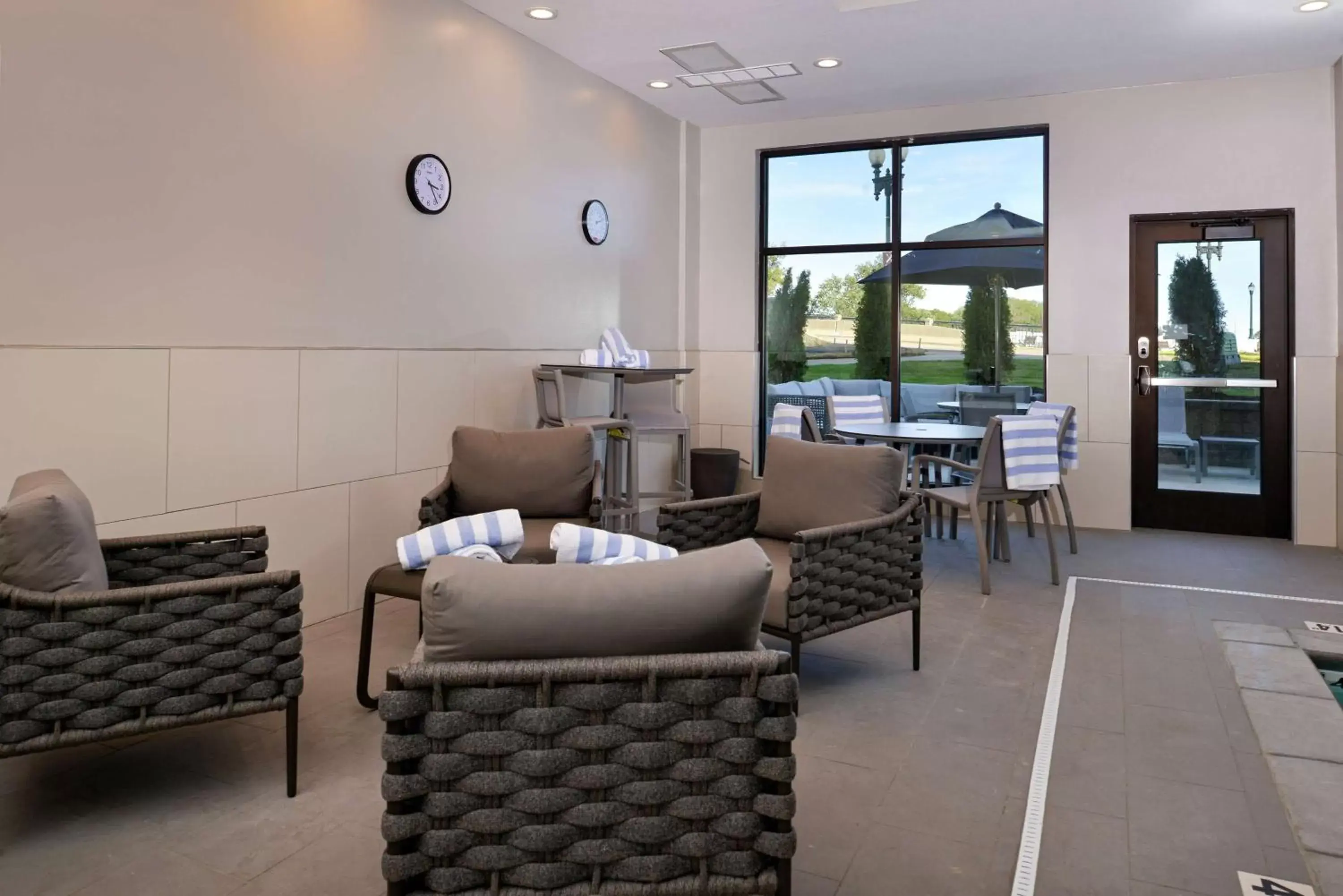 Pool view, Seating Area in Hampton Inn Cedar Falls Downtown, Ia