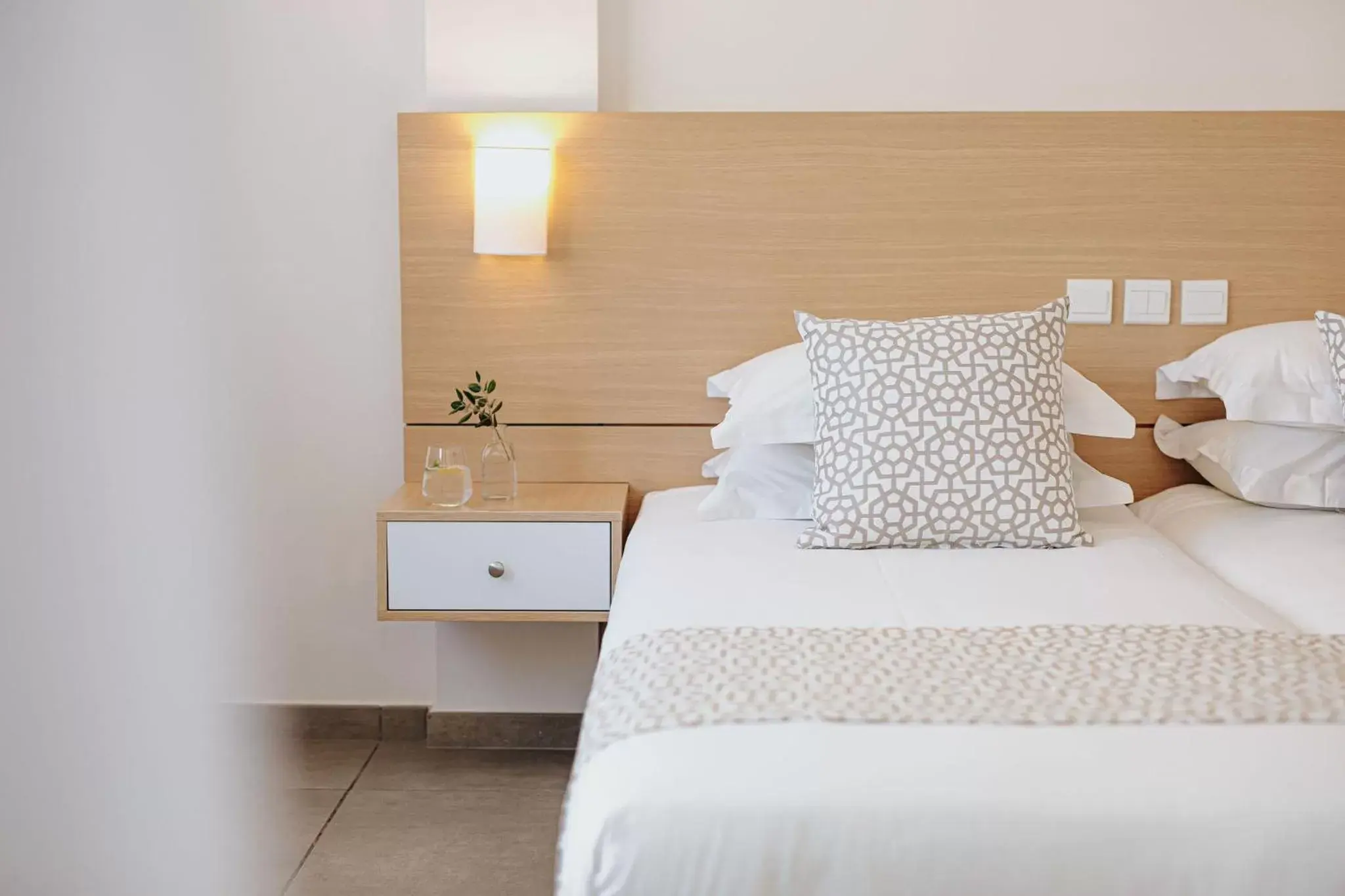Bed in Sofianna Resort & Spa