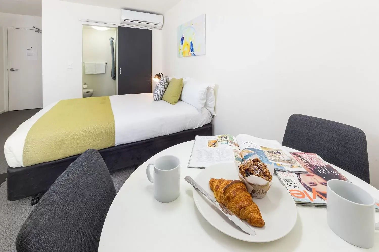 Dining area, Bed in City Edge North Melbourne Apartment Hotel