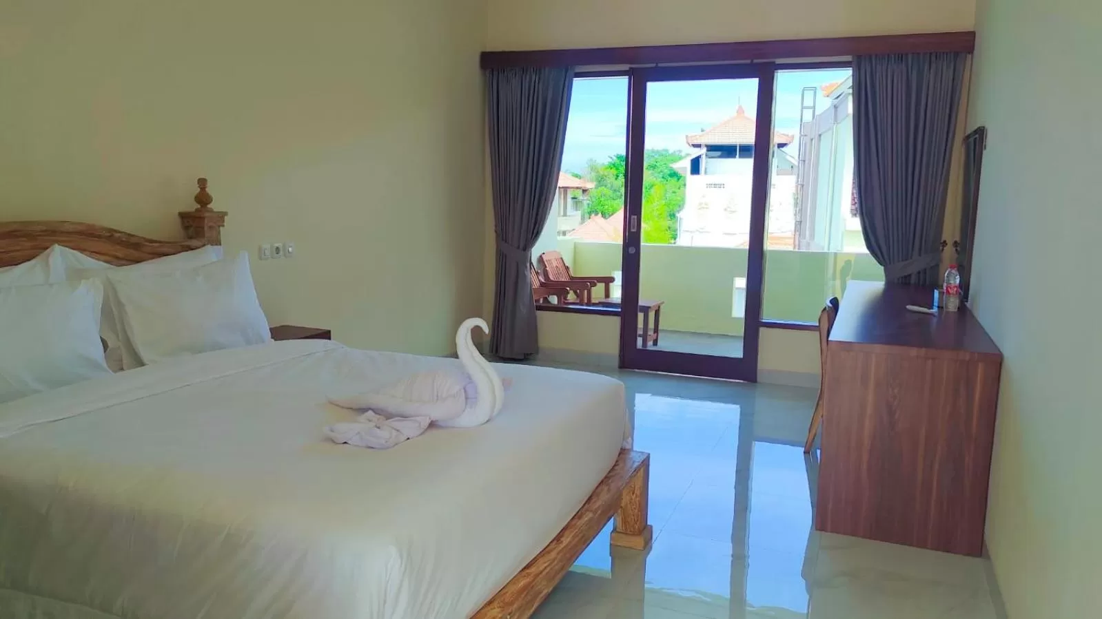 Bed in THE LAVIANA HOTEL