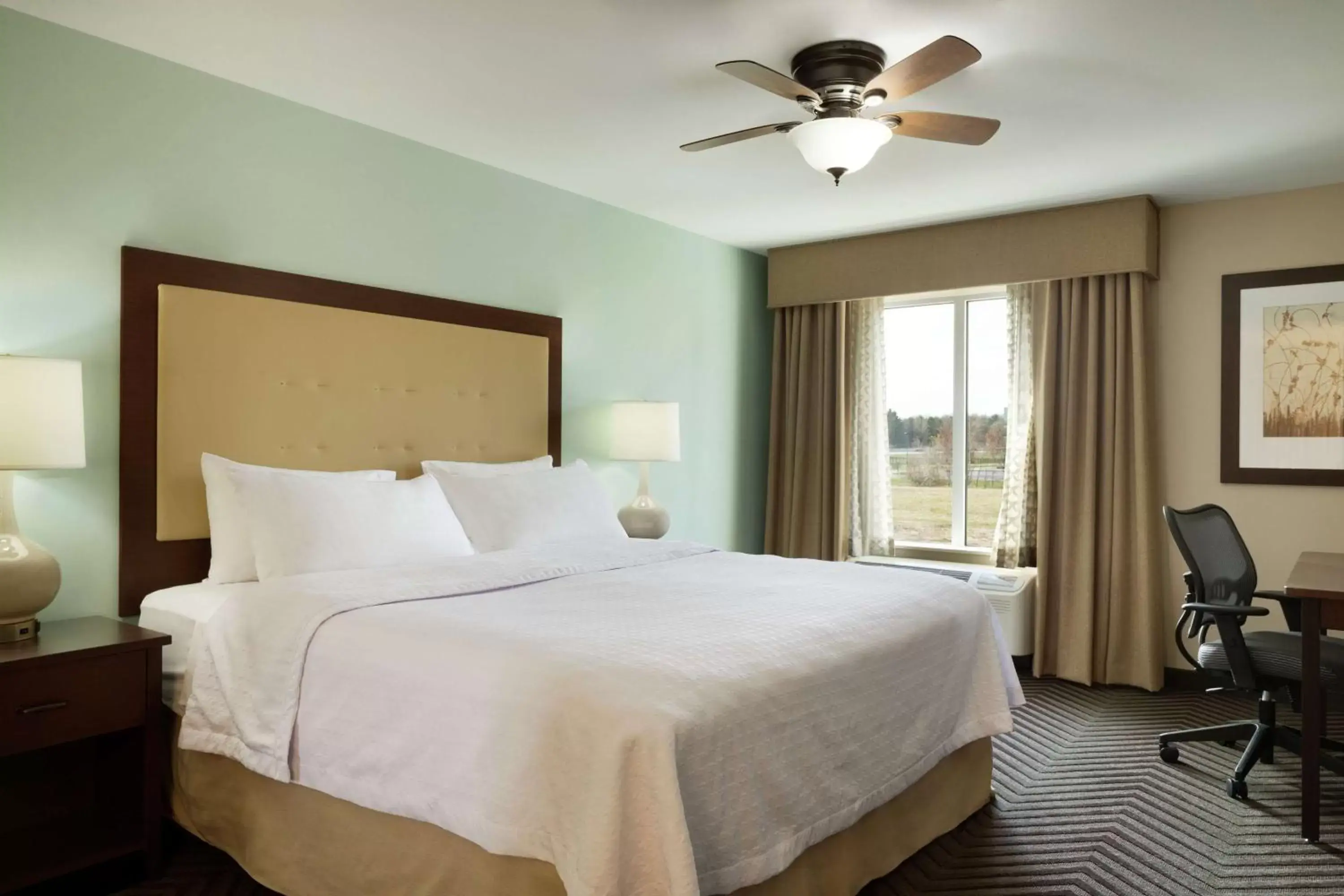 Bed in Homewood Suites by Hilton Kalamazoo-Portage