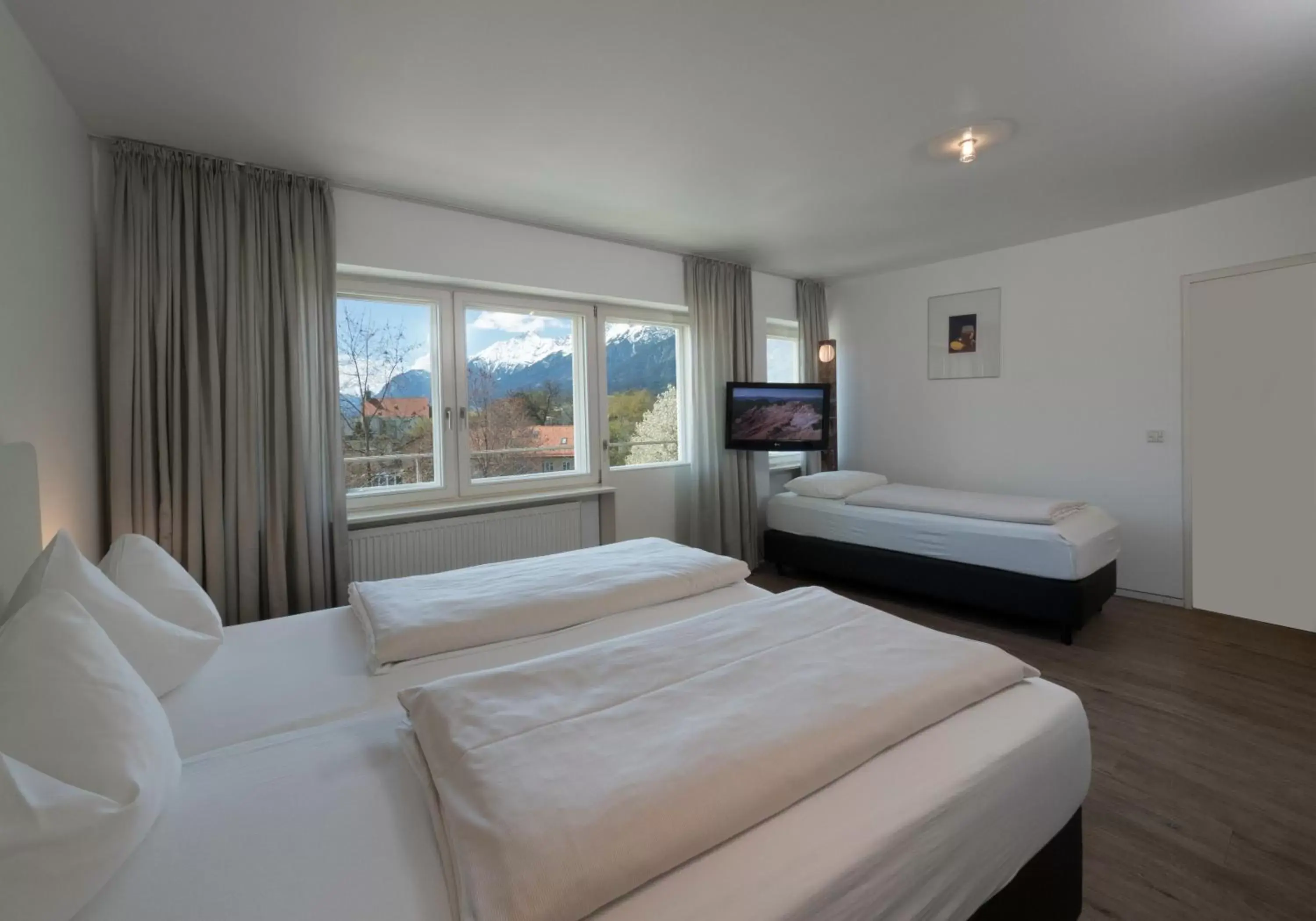 Photo of the whole room, Bed in Parkhotel Hall in Tirol