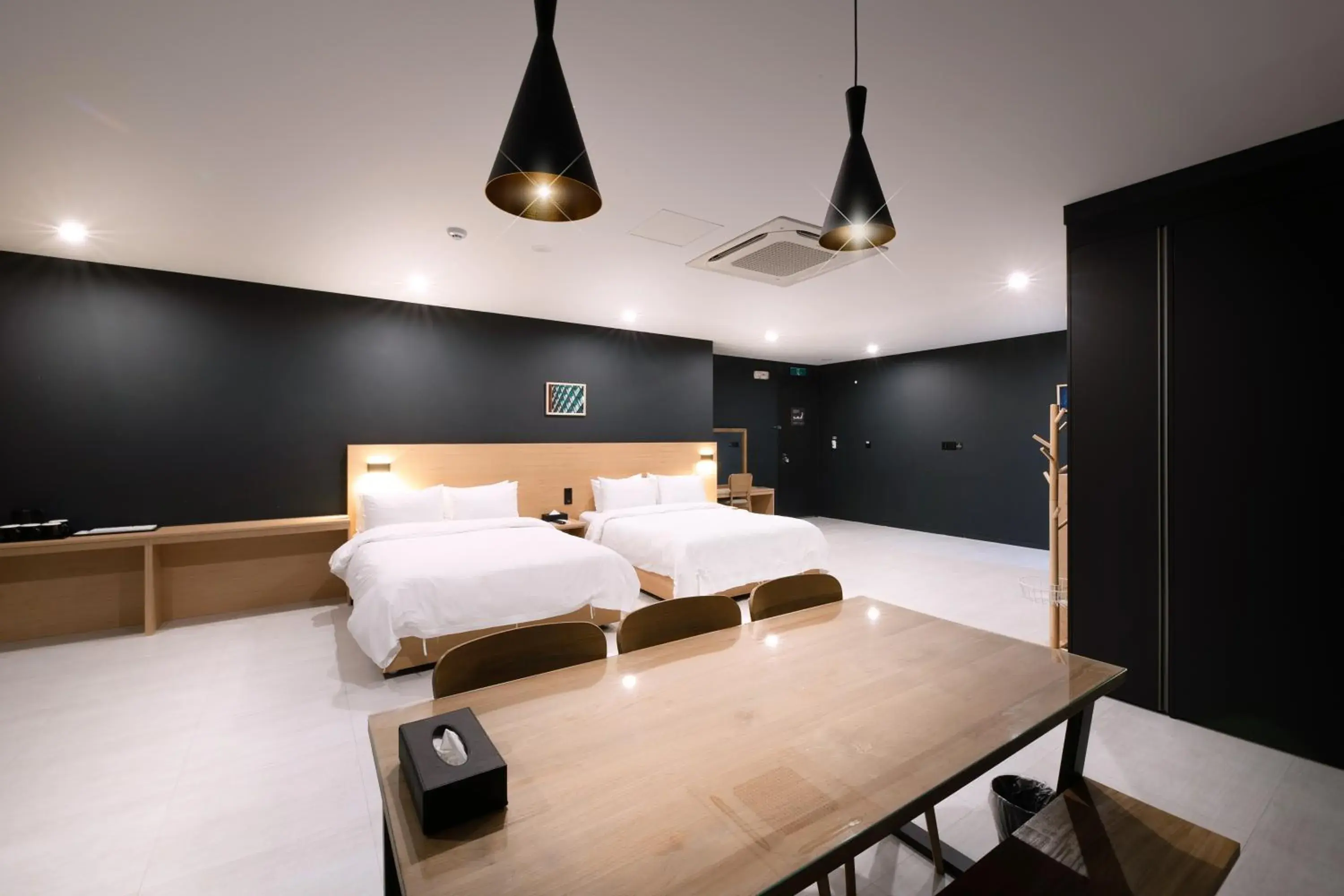 Bed in Mipo Oceanside Hotel Bed in Mipo Oceanside Hotel