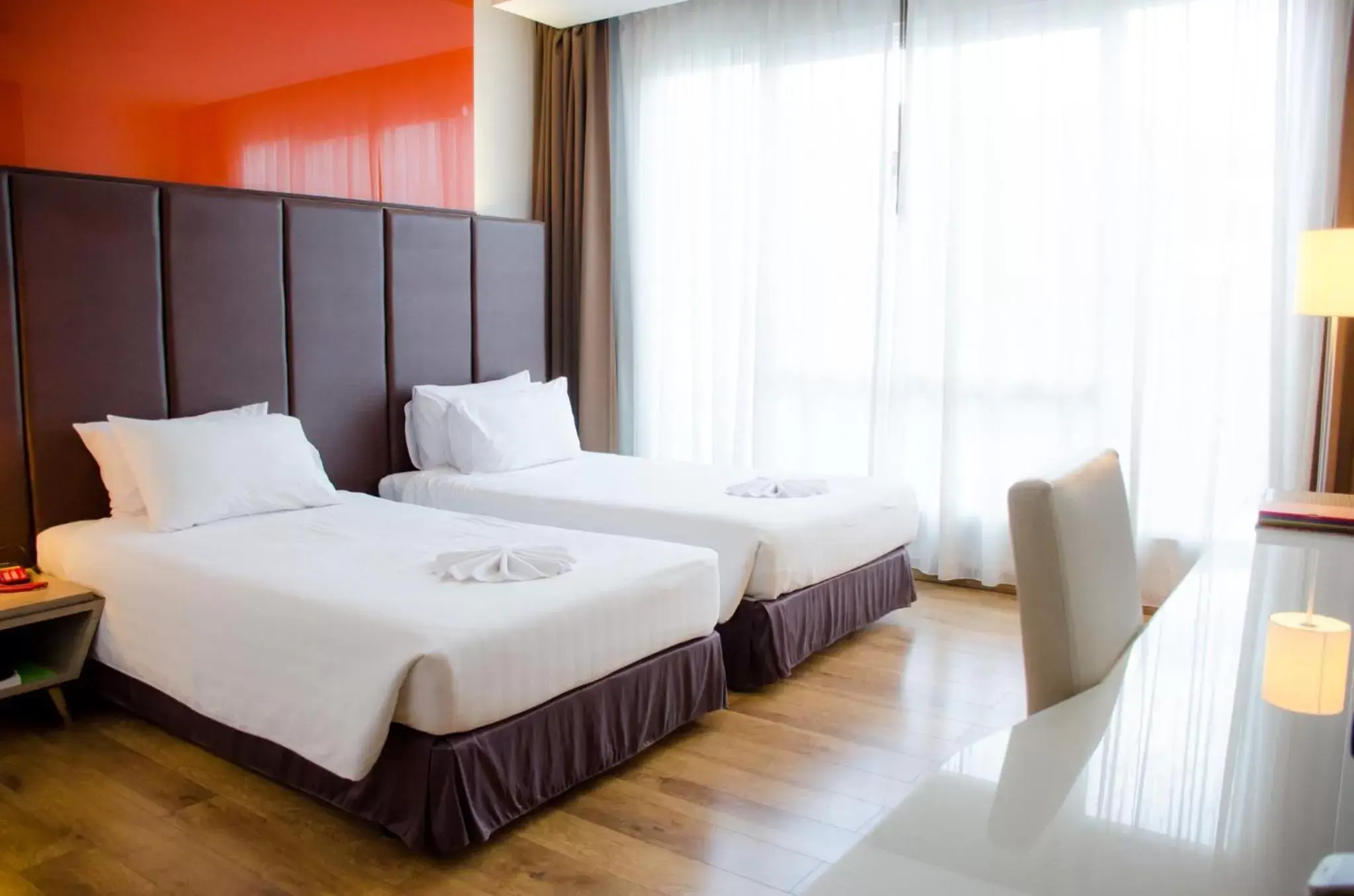 Bed in Prajaktra Design Hotel
