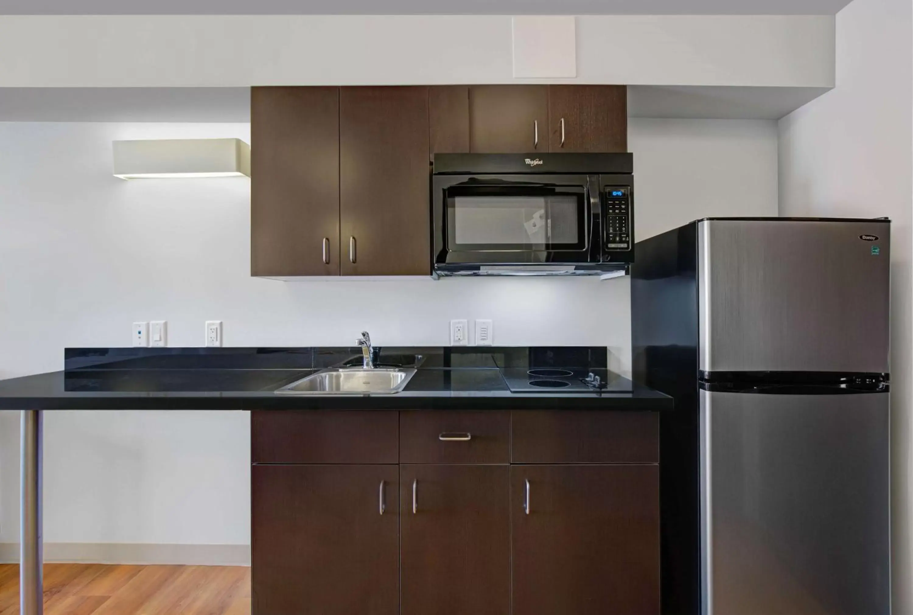 Kitchen or kitchenette, Kitchen/Kitchenette in Motel 6 Airdrie