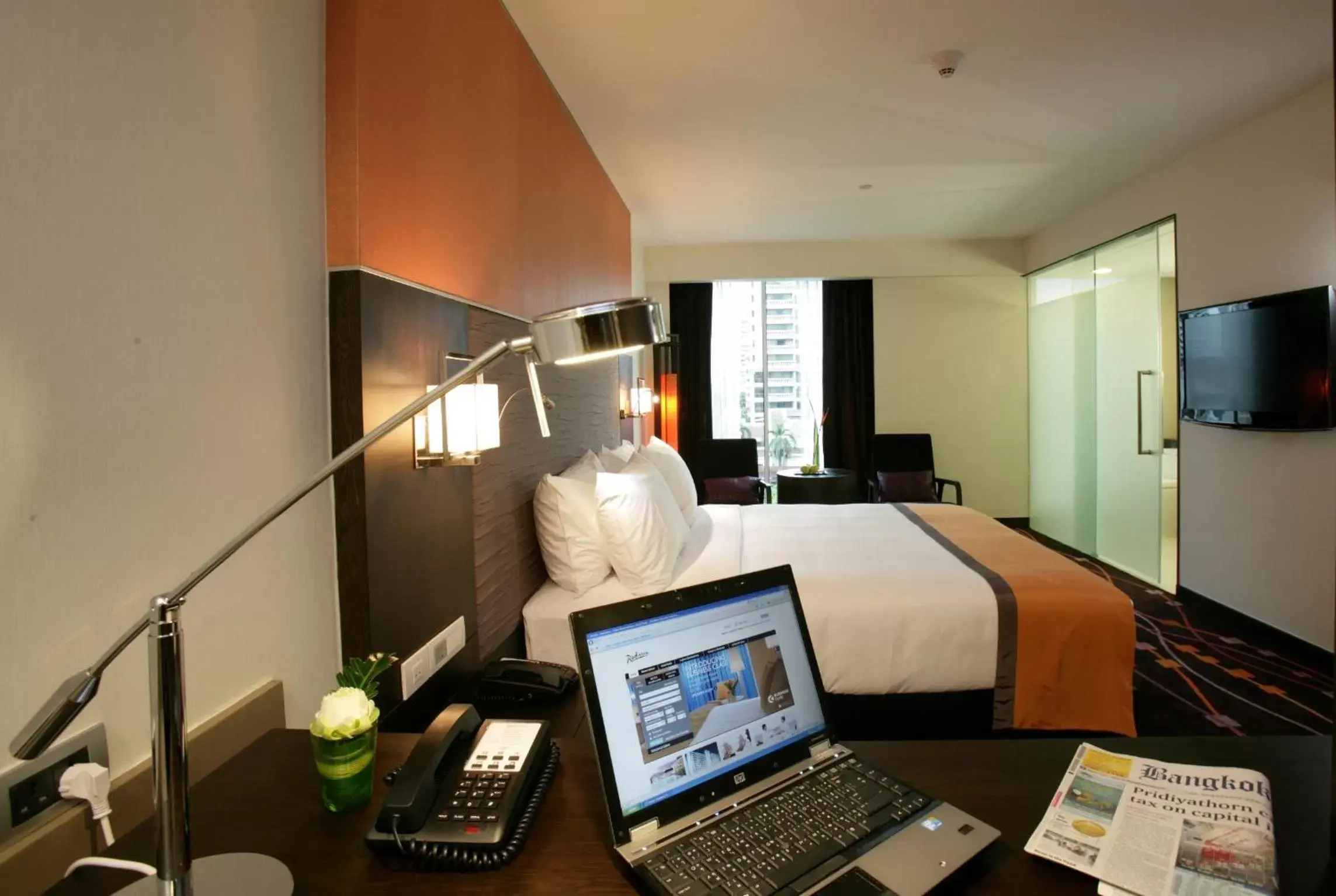 Bed in Radisson Suites Bangkok Sukhumvit - SHA Extra Plus