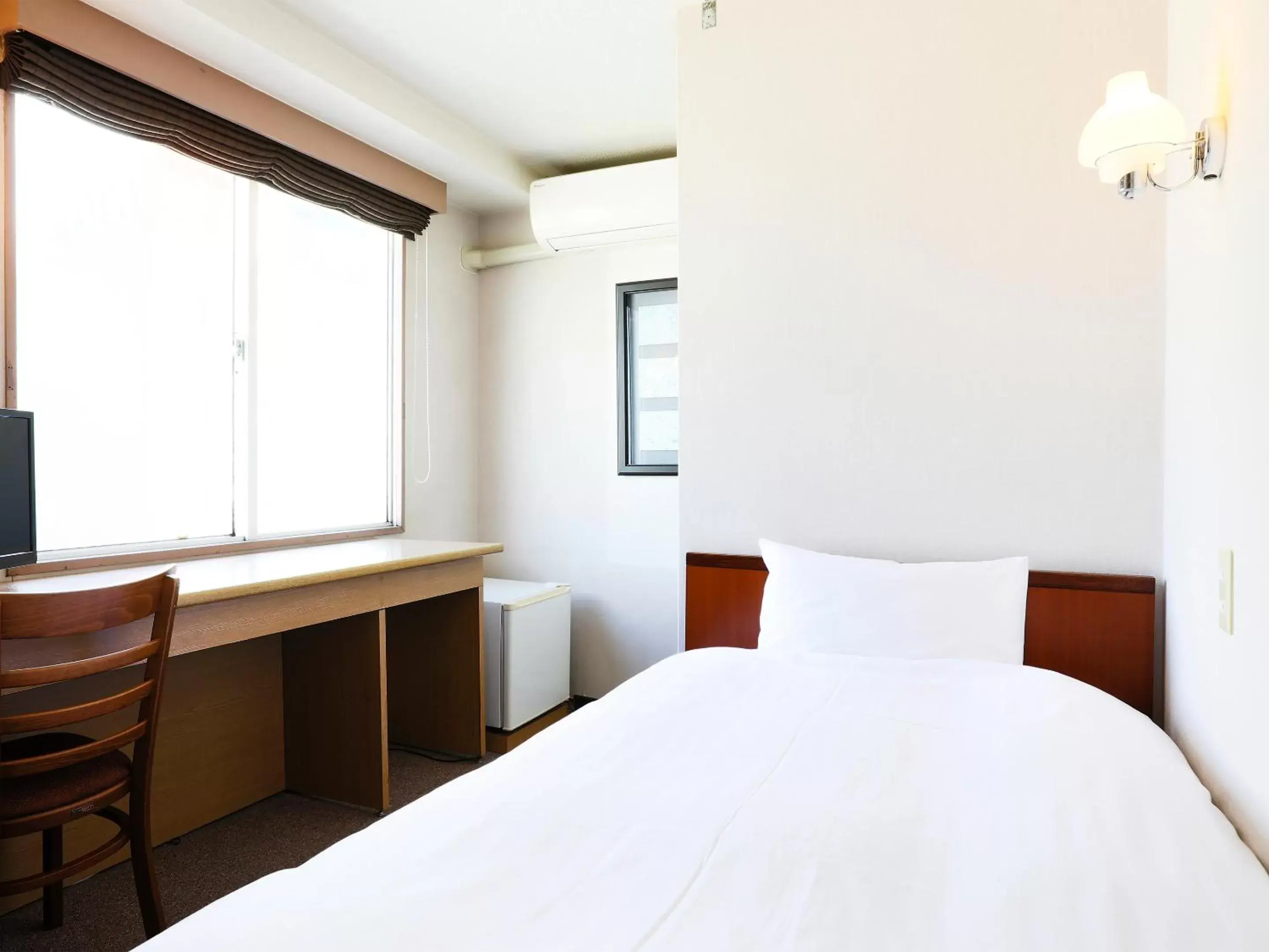 Photo of the whole room, Bed in Hotel New Nishino