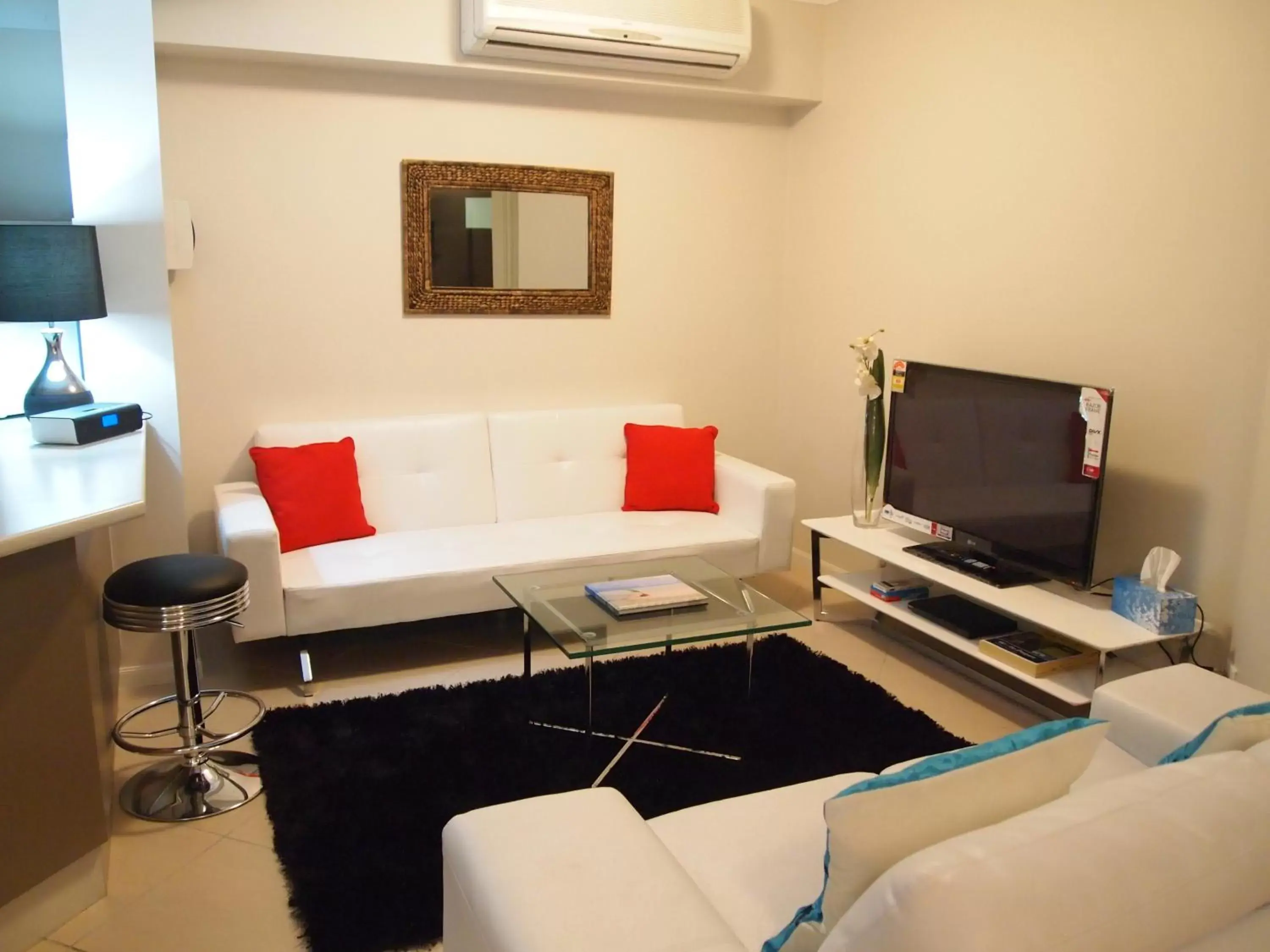 TV and multimedia, Seating Area in Edge Apartments Cairns