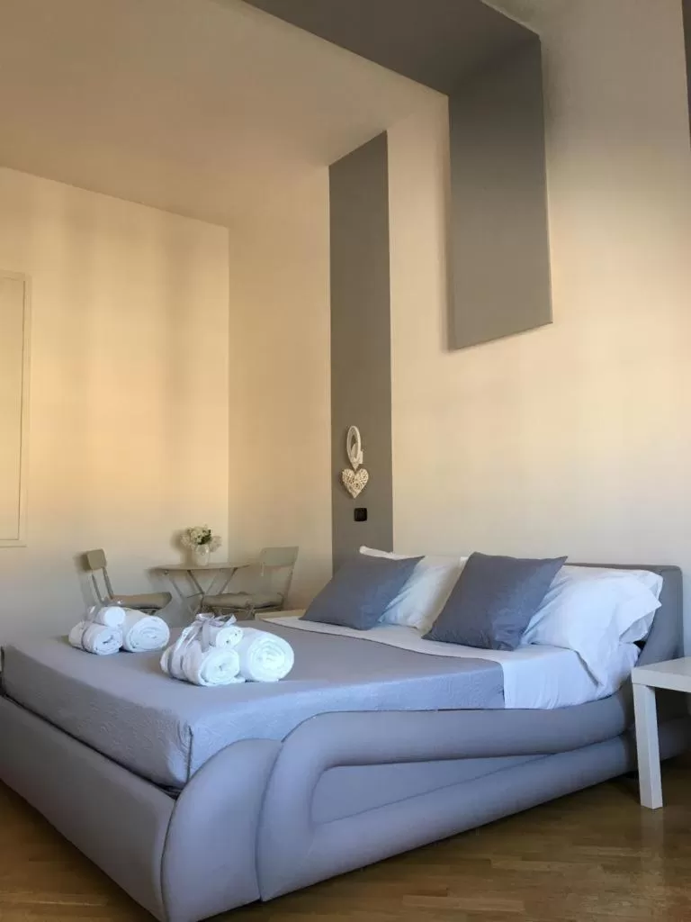 Bed in Maison Arena Bovio