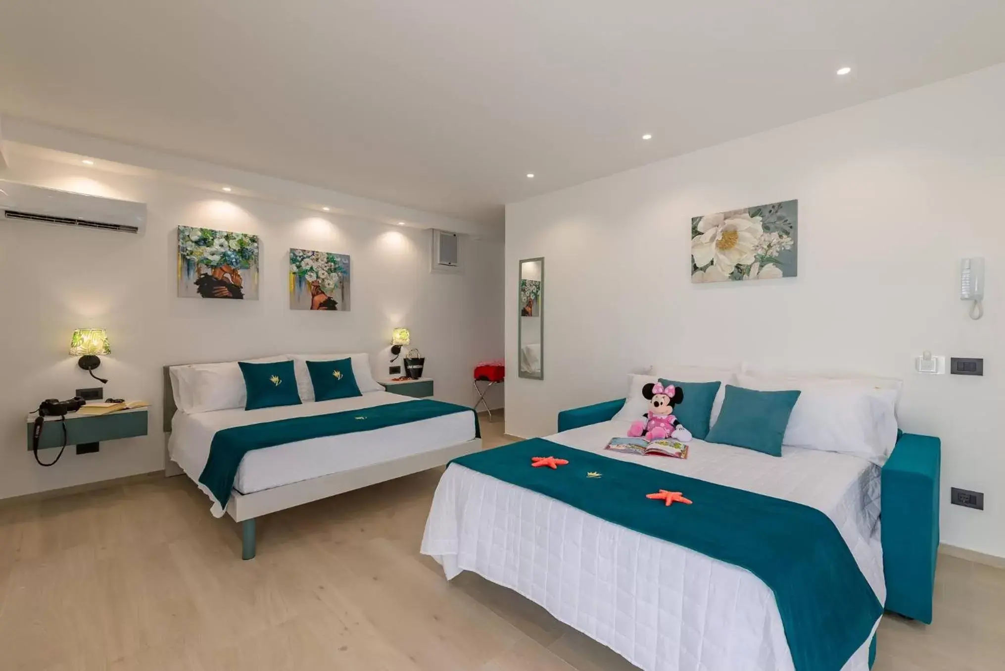 Bed in Vittoria Luxury Rooms