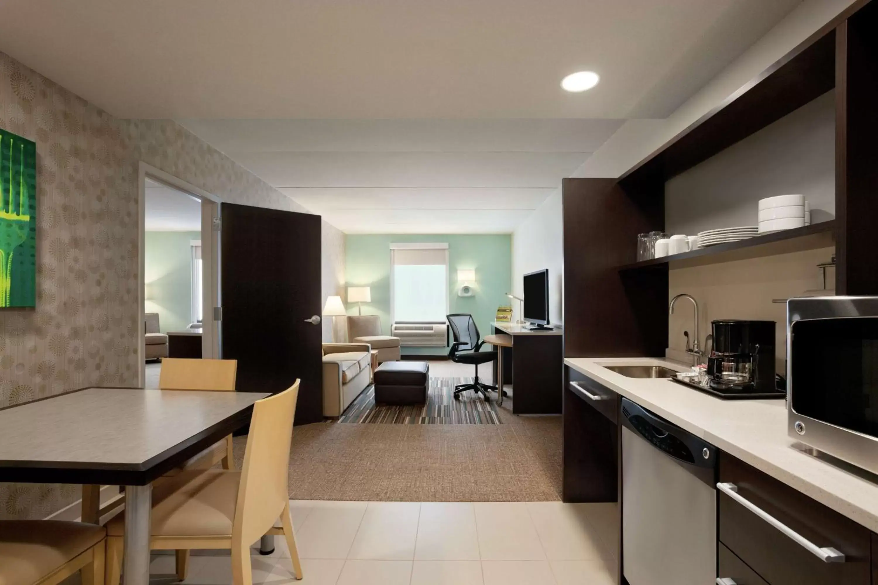 Bedroom, Kitchen/Kitchenette in Home2 Suites by Hilton Philadelphia Convention Center