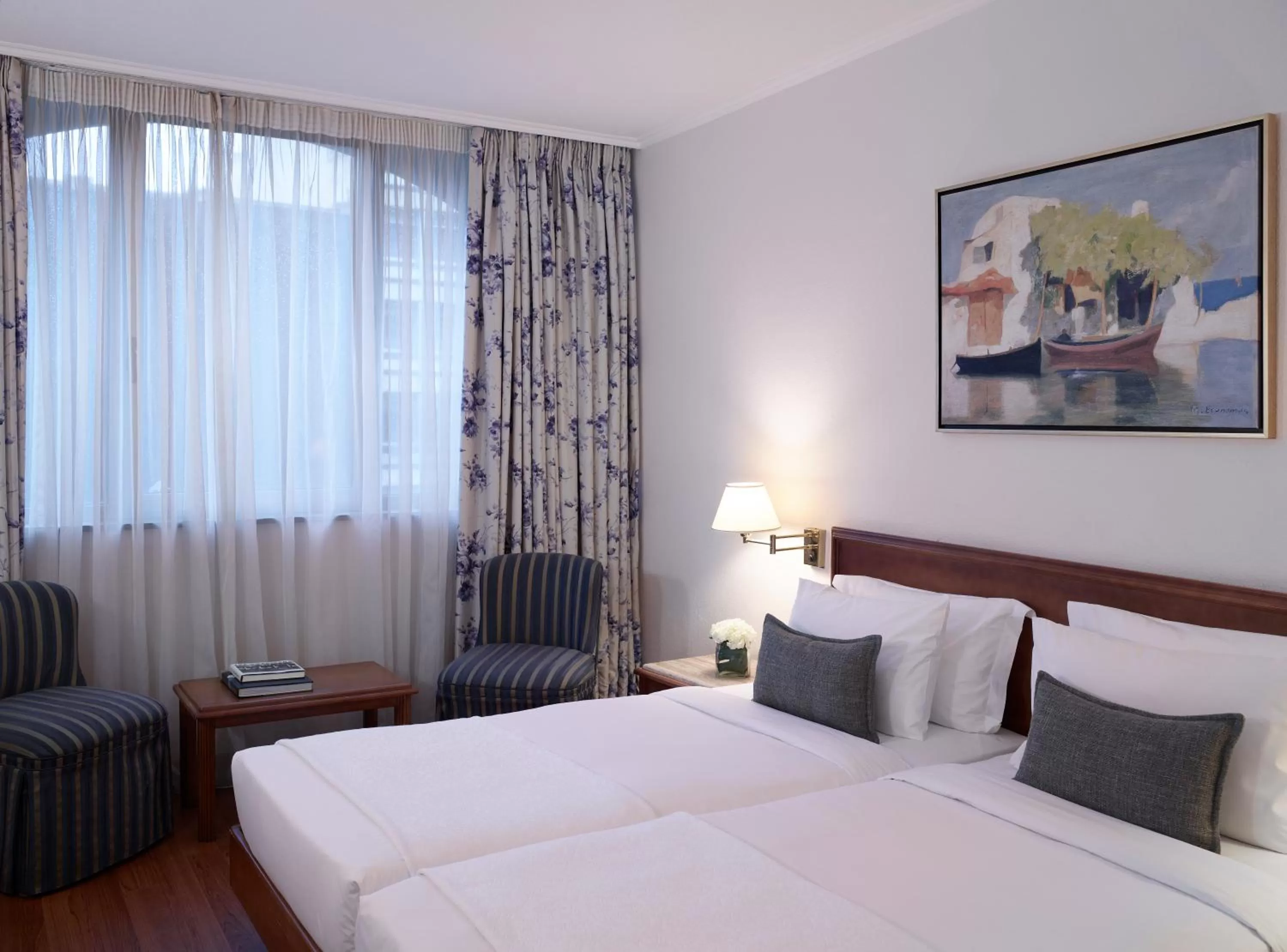 Bed in Titania Hotel