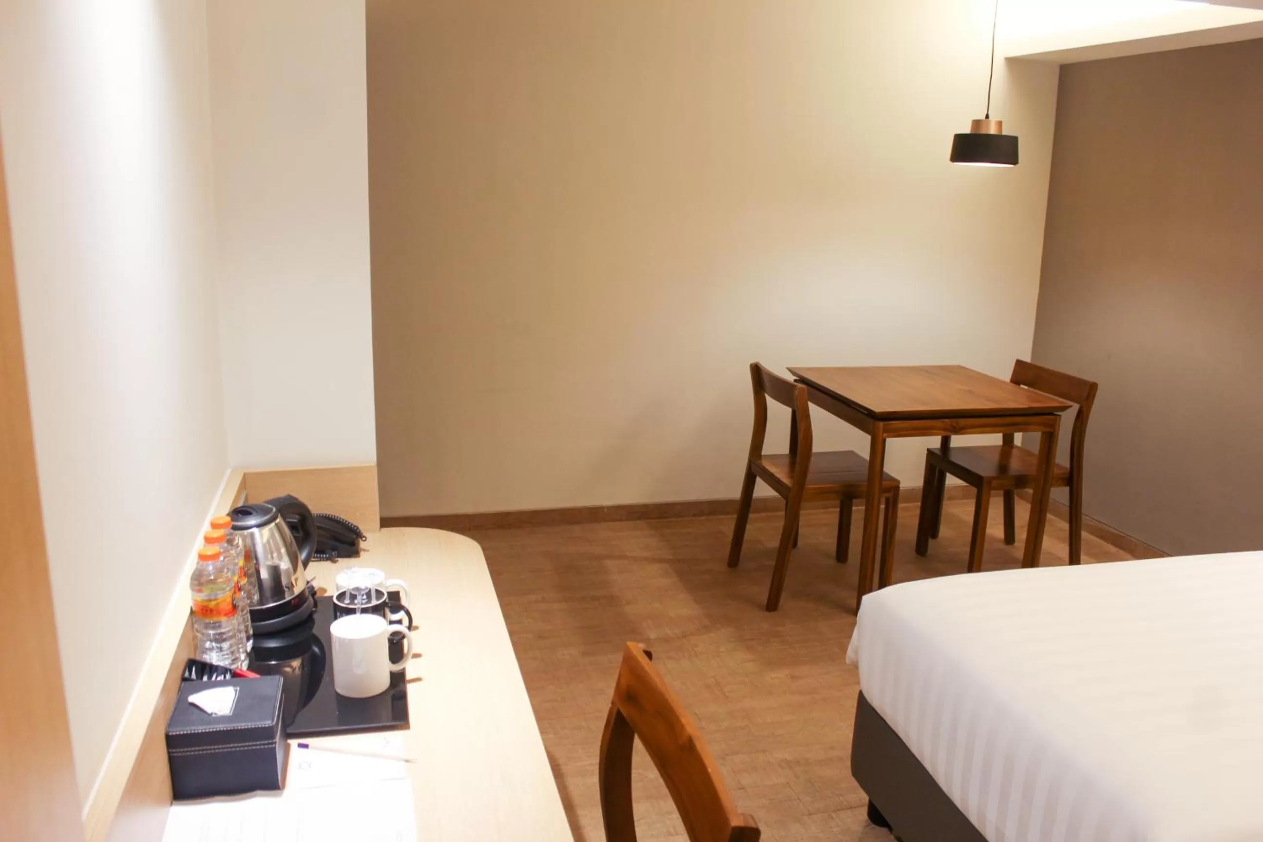 Dining area, Bed in Aveta Hotel Malioboro