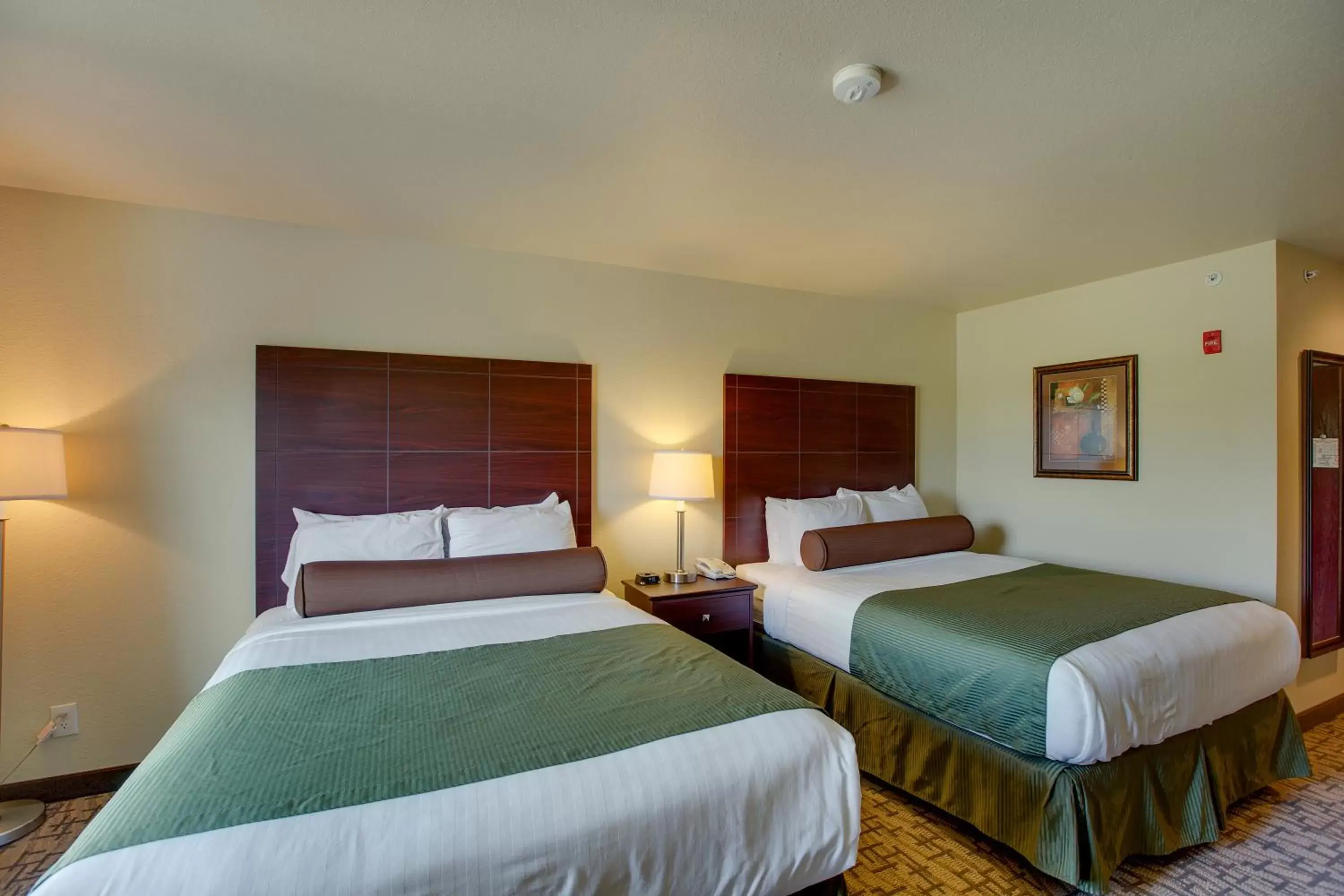 Bed in Cobblestone Inn & Suites - Clintonville