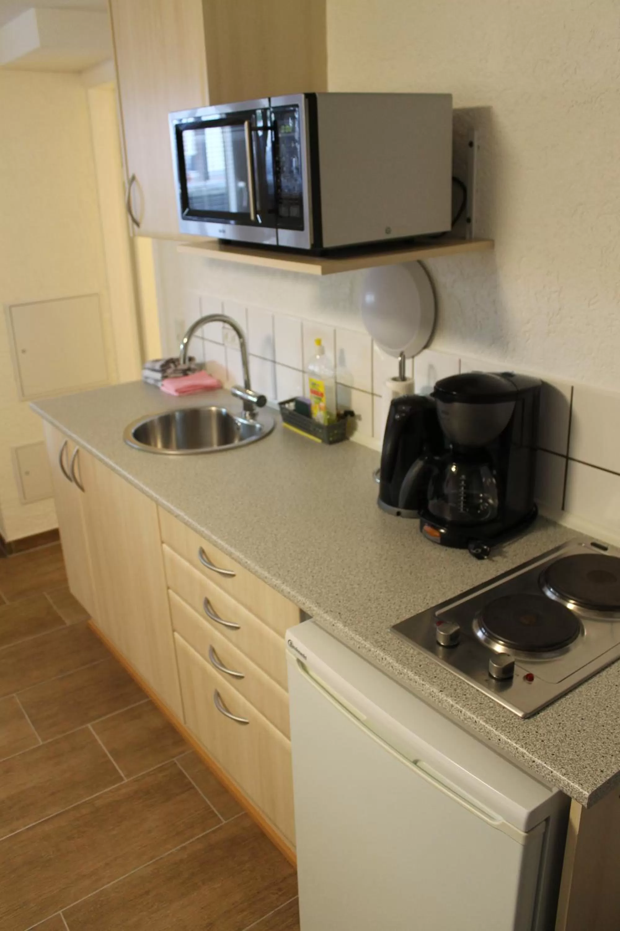 Kitchen or kitchenette in Amalie Bed and Breakfast & Apartments