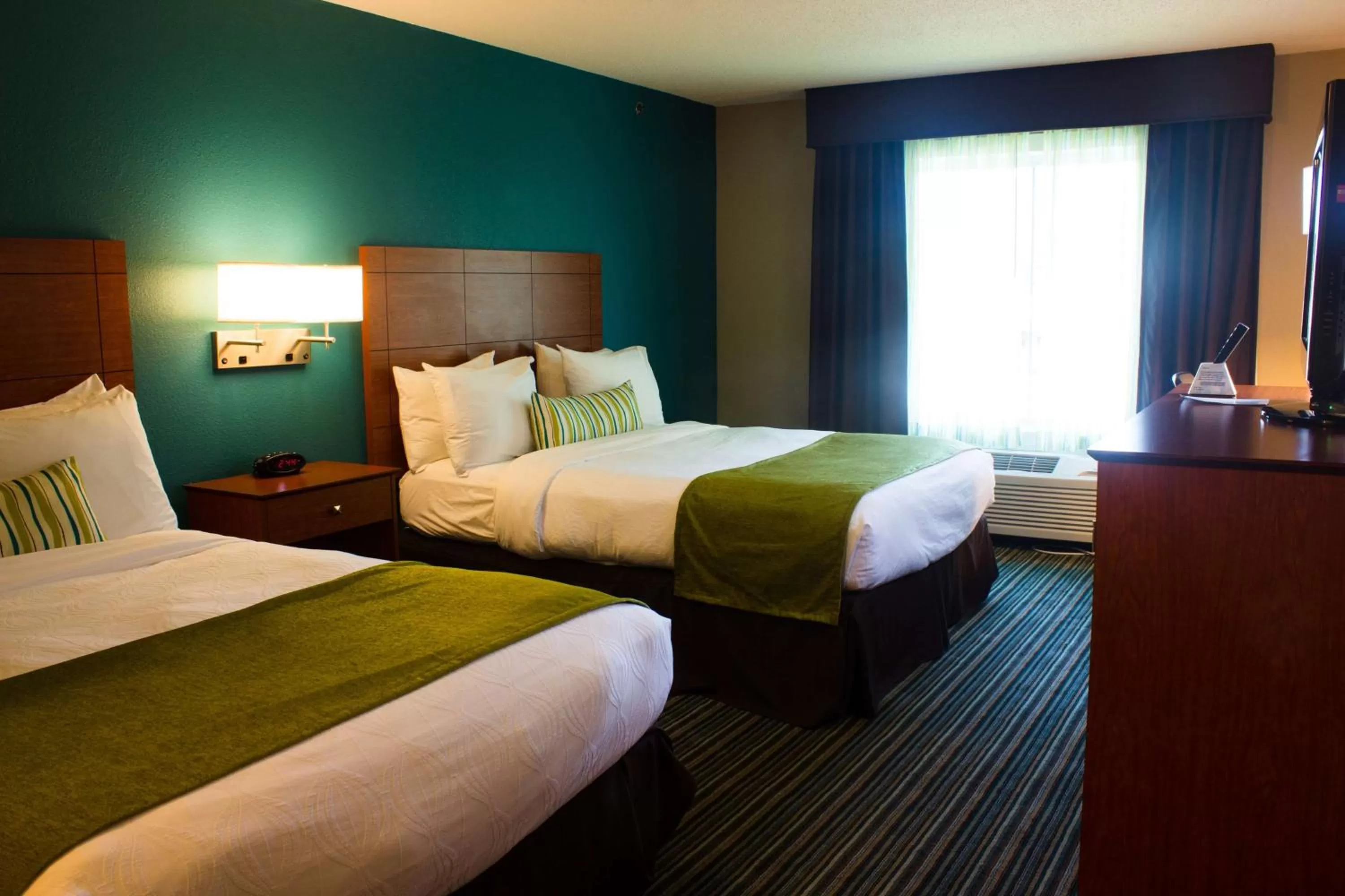 Photo of the whole room, Bed in BEST WESTERN Plus Menomonie Inn & Suites