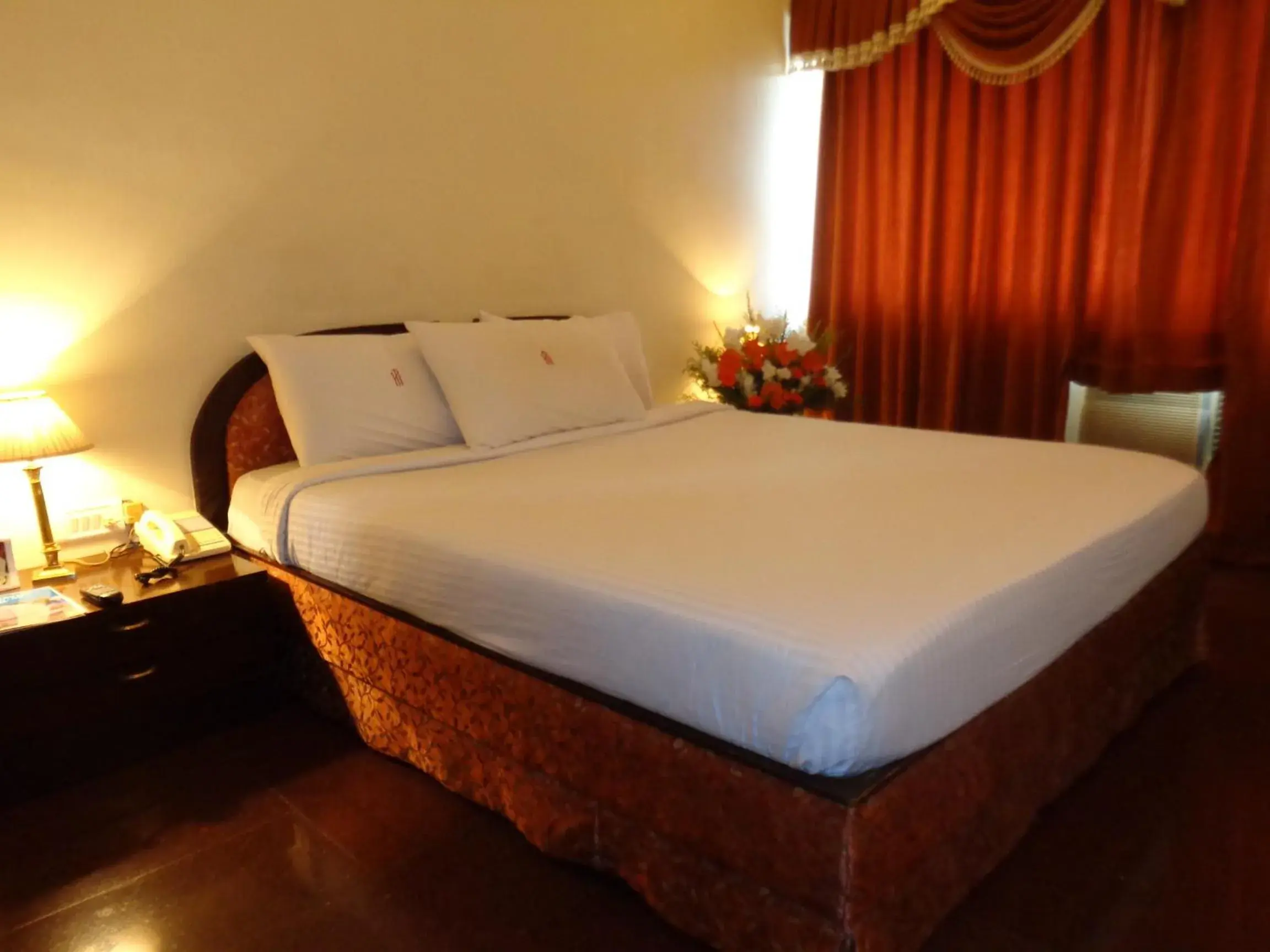 Photo of the whole room, Bed in Hotel Poonja International