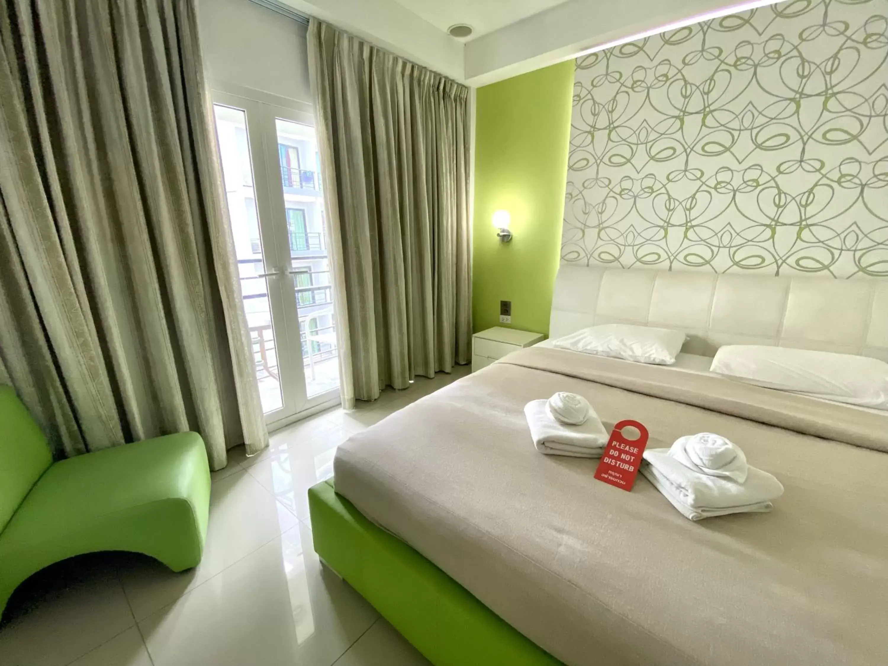 Bed in Access Inn Pattaya