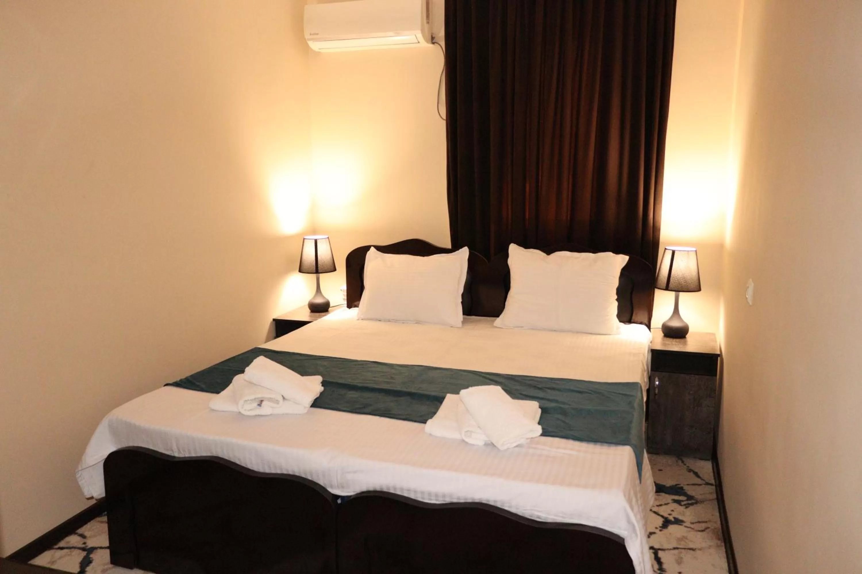 Bed in Al Bukhari Boutique Hotel