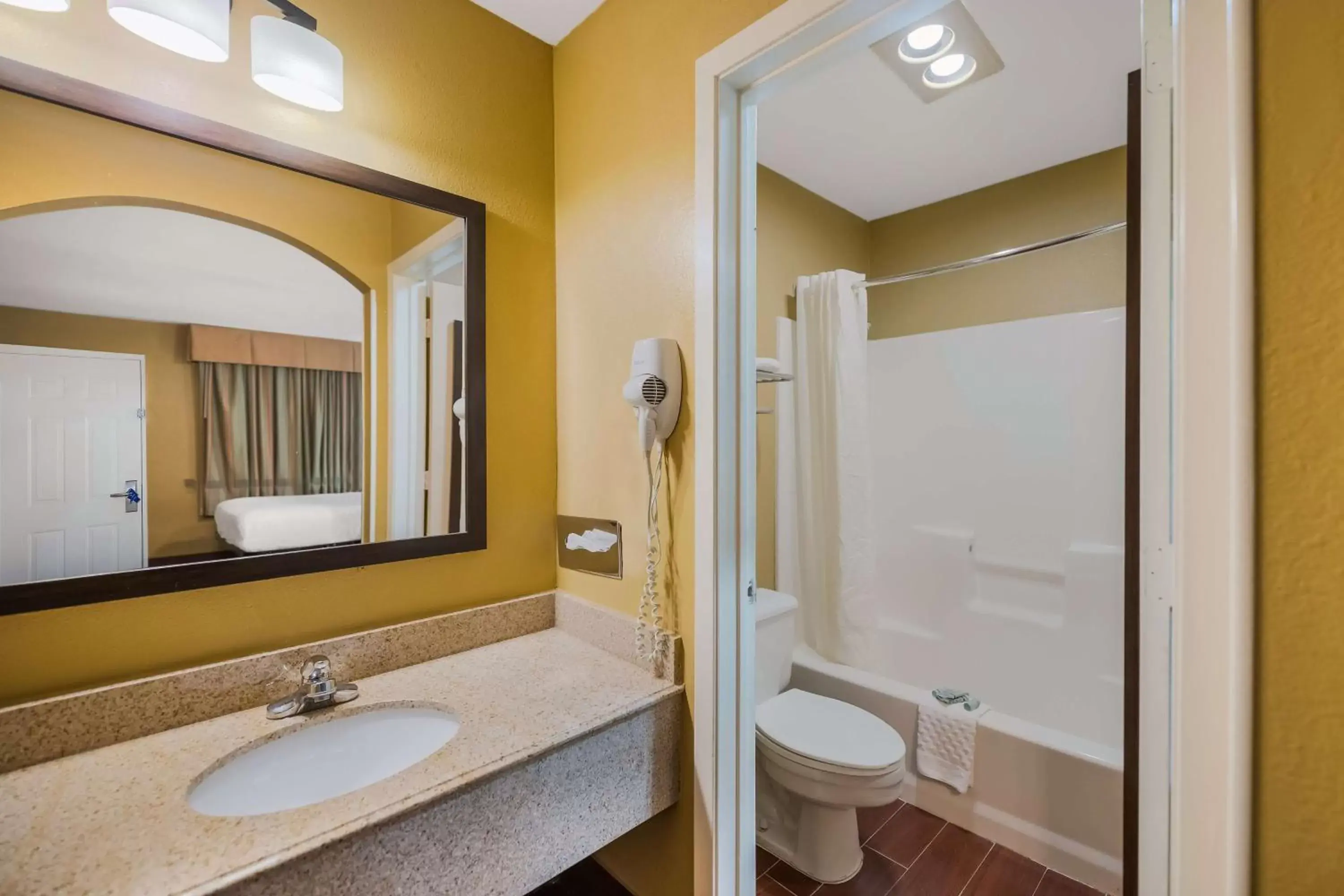 Bathroom in SureStay Hotel by Best Western Mt Pleasant