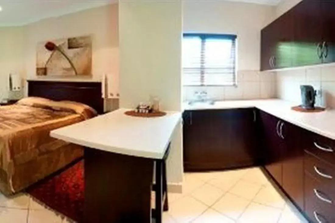 Photo of the whole room, Kitchen/Kitchenette in Rustenburg Boutique Hotel