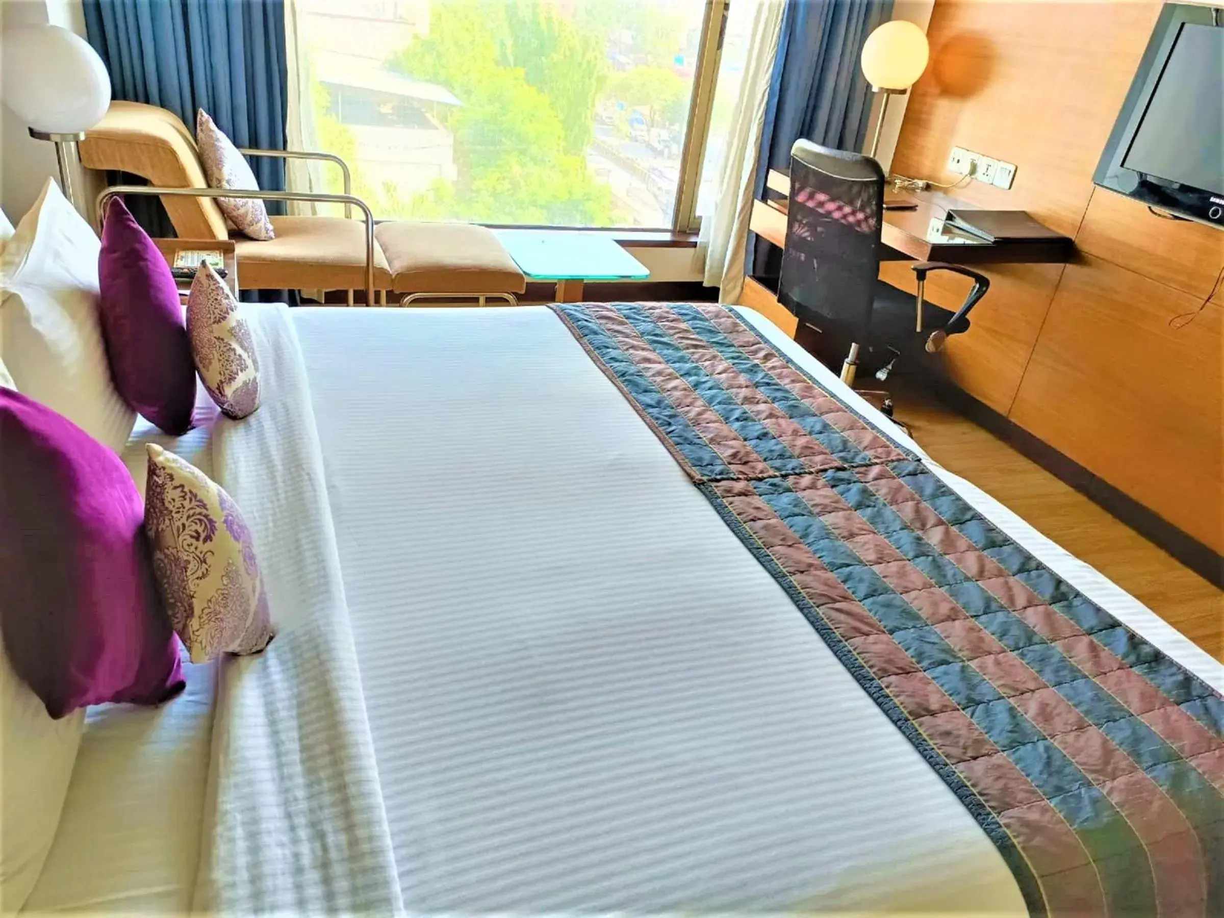 Bed in Hotel Yogi Executive