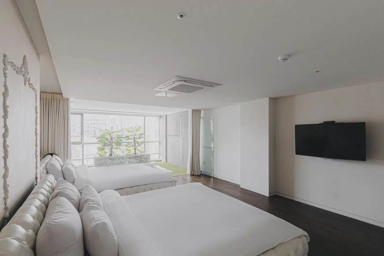 Bed in ACC Design Hotel