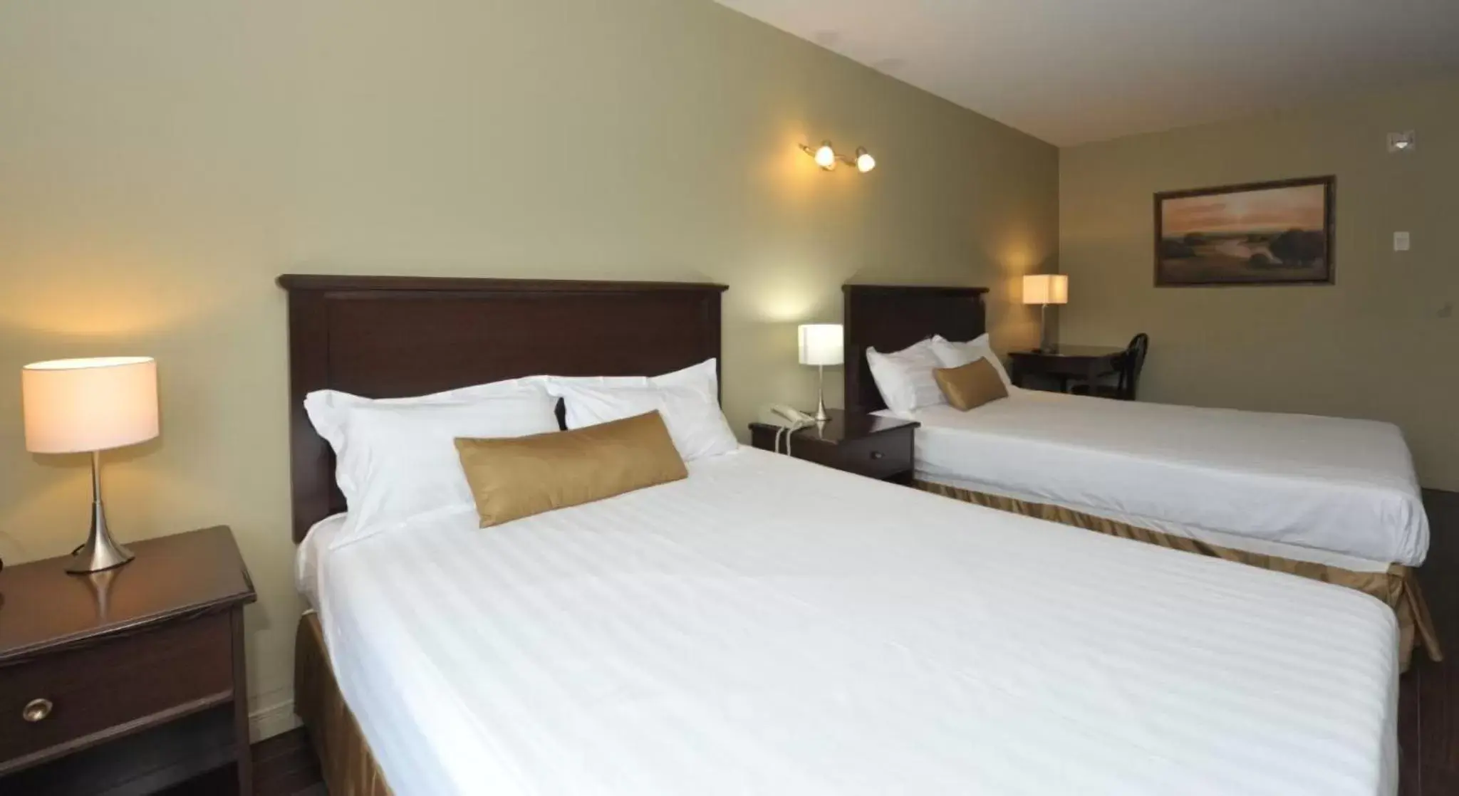 Bed in Hotel Le Voyageur
