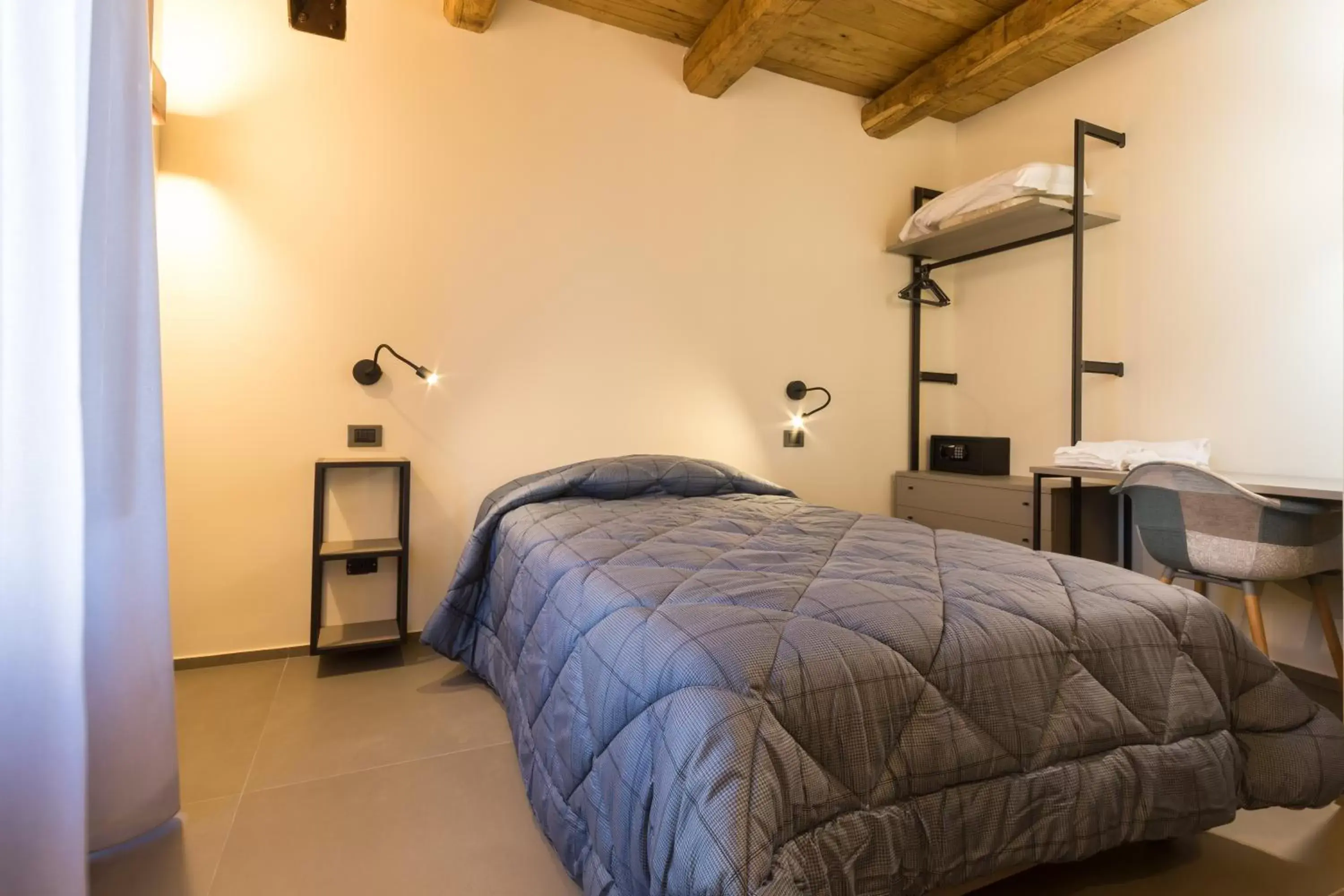 Bed in Borgotufi Albergo Diffuso