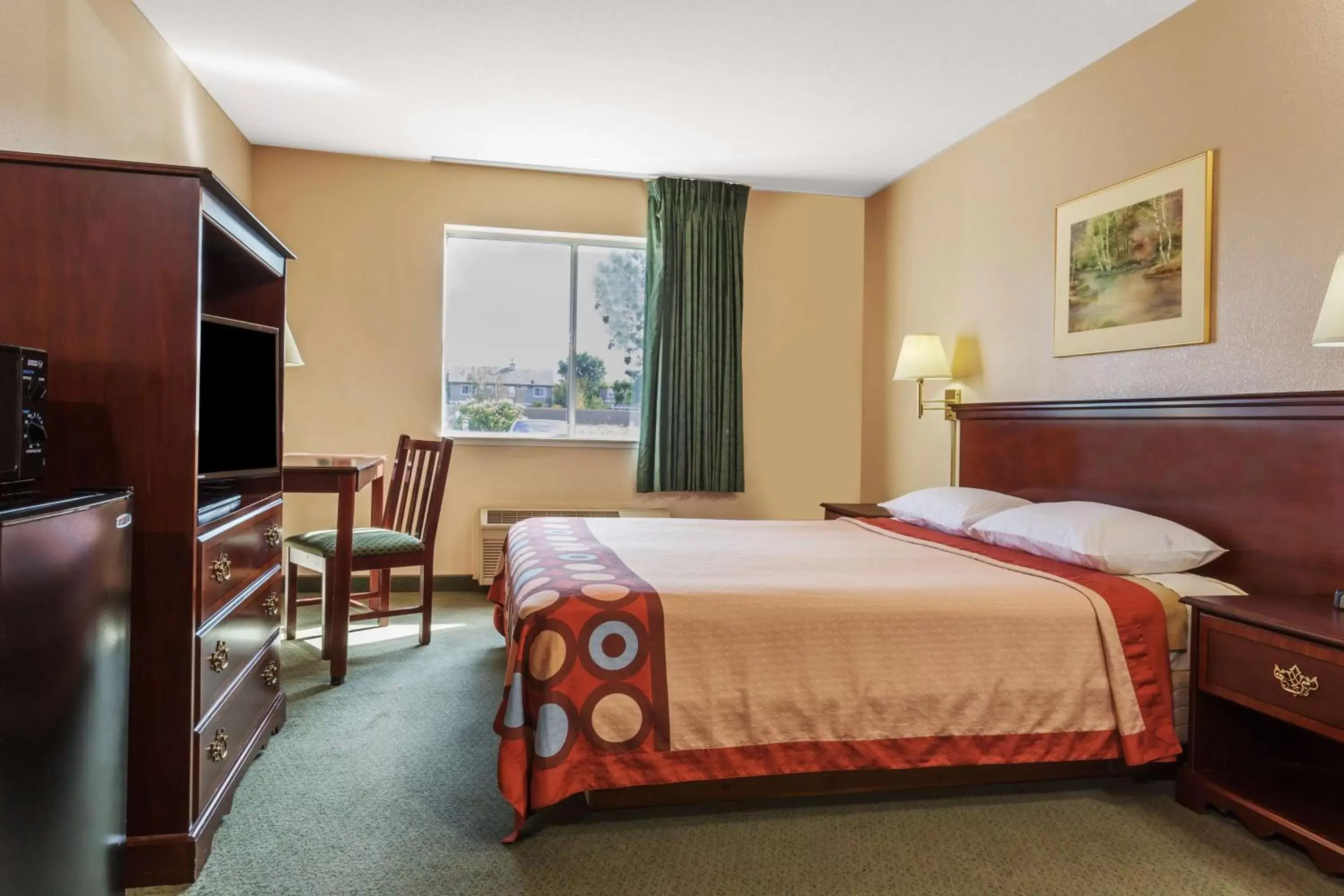 Photo of the whole room, Bed in Super 8 by Wyndham Dixon/UC Davis