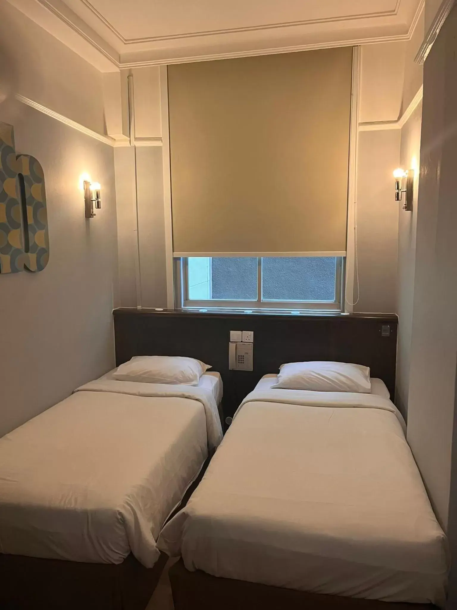 Bed in Hotel Bencoolen Singapore