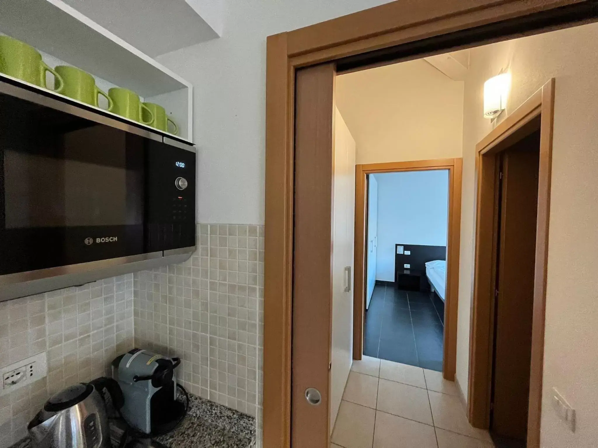 Kitchen or kitchenette, TV/Entertainment Center in 4 Limoni Apartment Resort