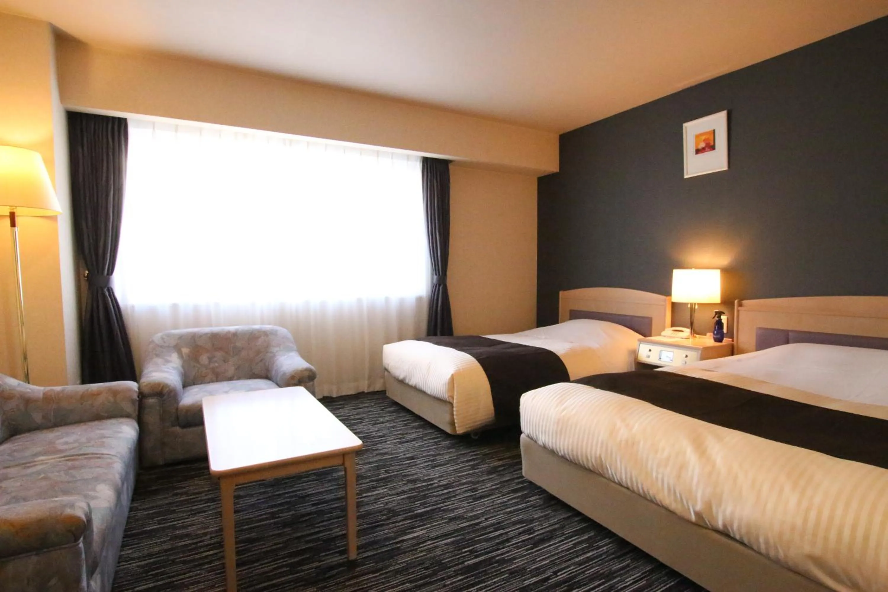 Living room, Bed in Kotoni Green Hotel