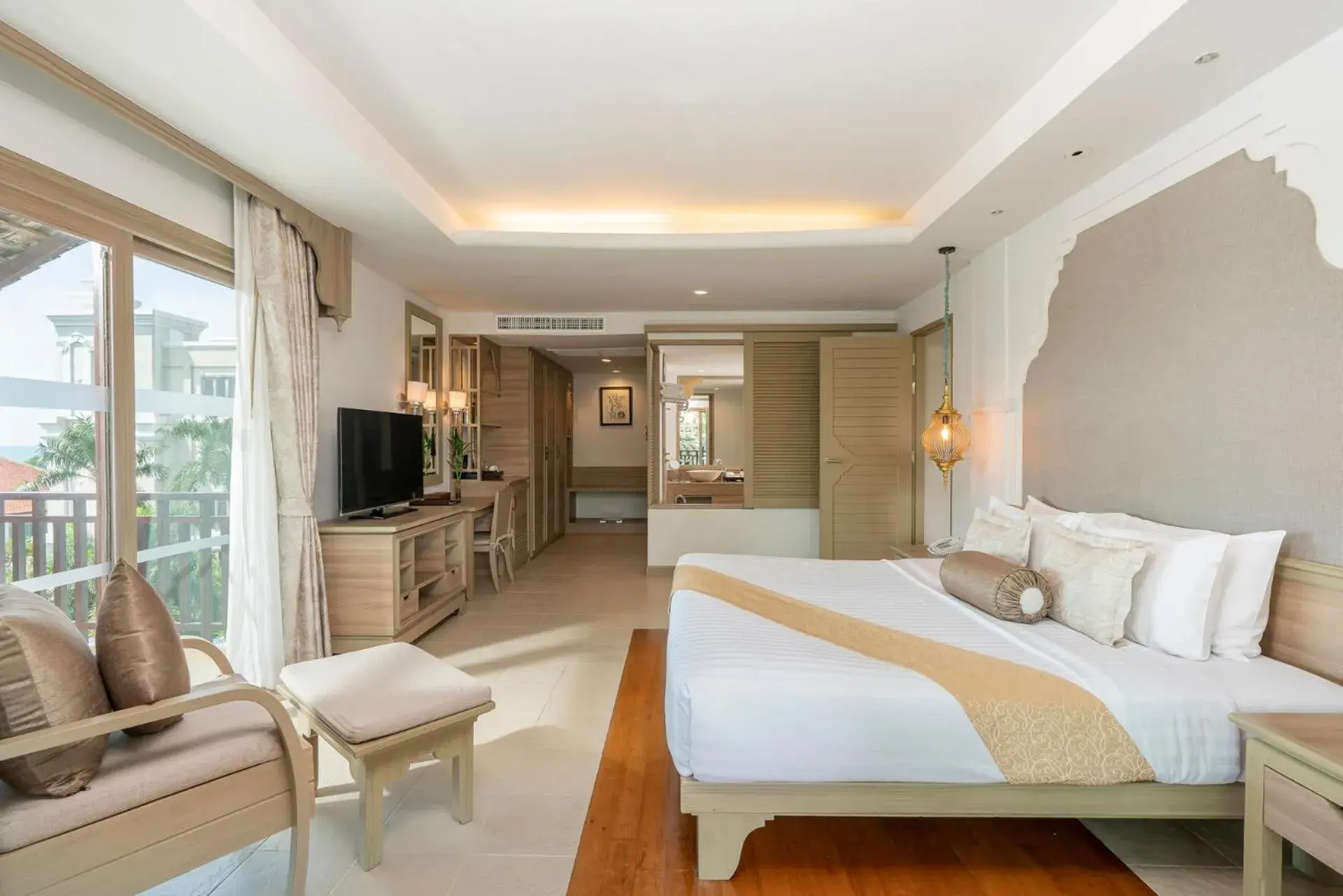 Bedroom in Ravindra Beach Resort & Spa - SHA Extra Plus