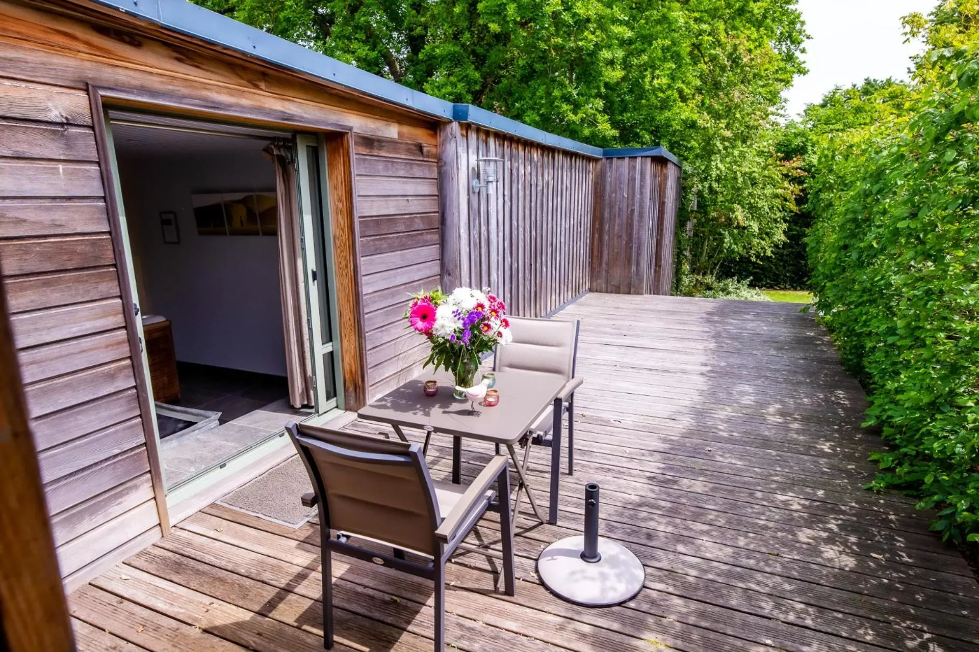 Patio in La Ferme de l'Oudon & SPA