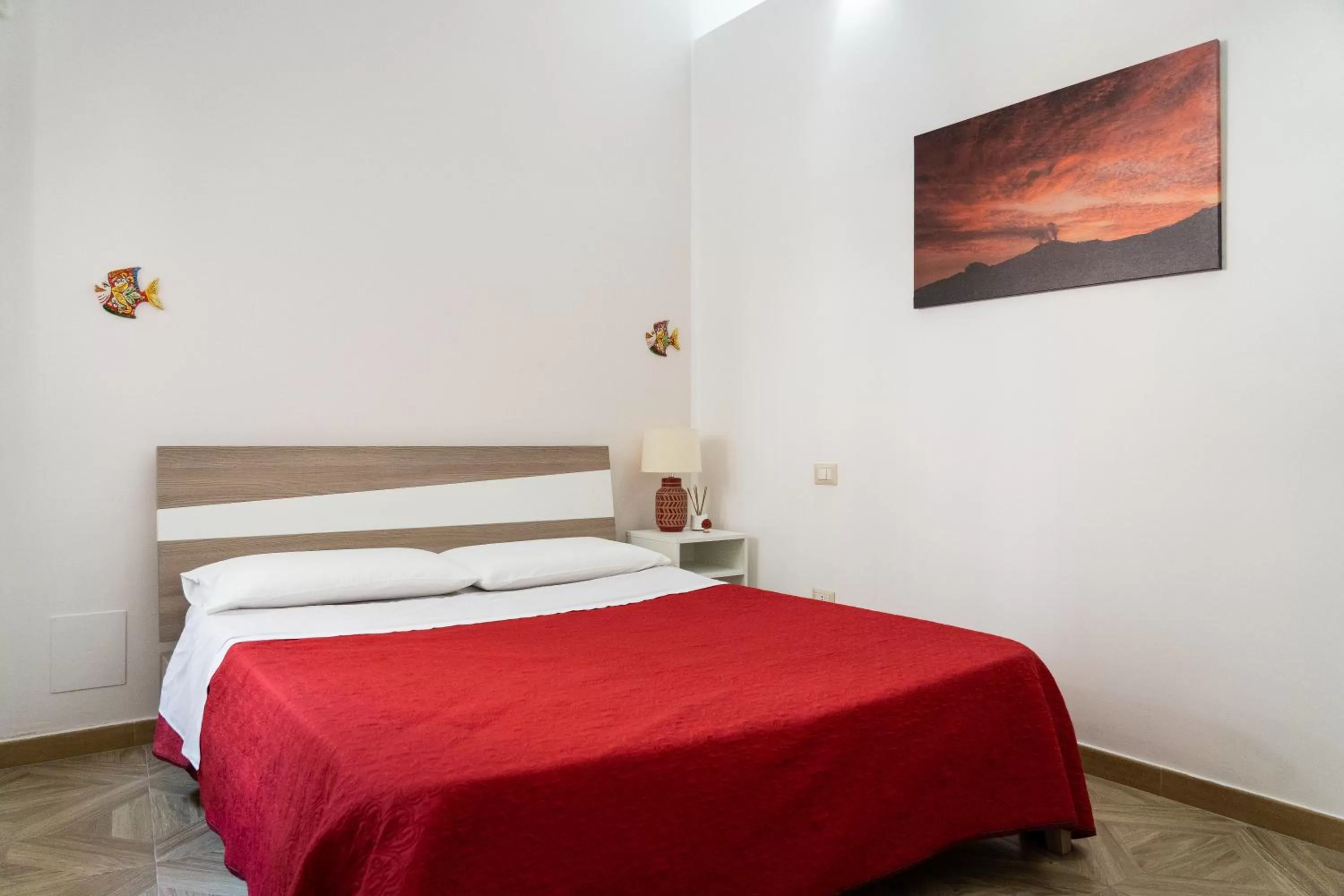 Bed in Portosalvo Rooms