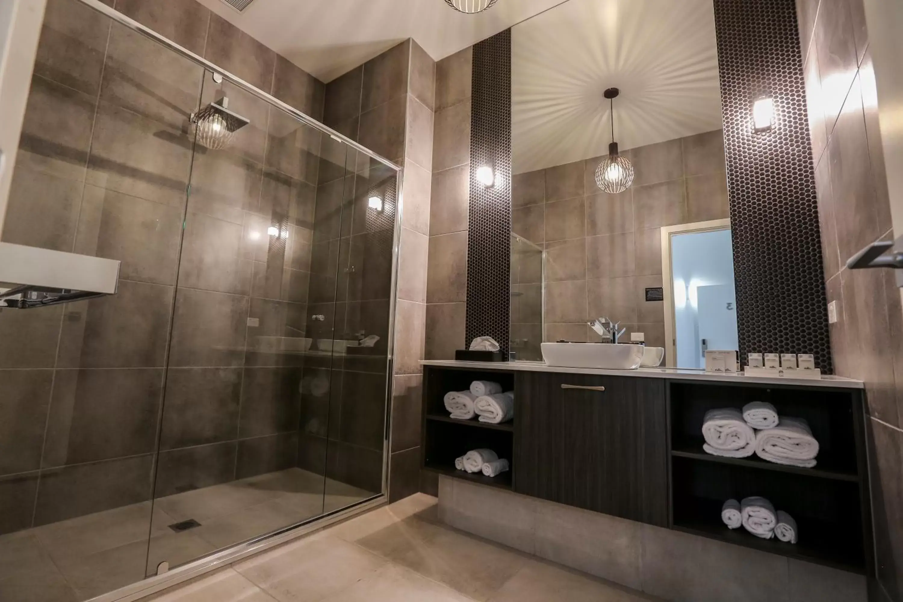 Shower, Bathroom in Indulge Apartments - CBD