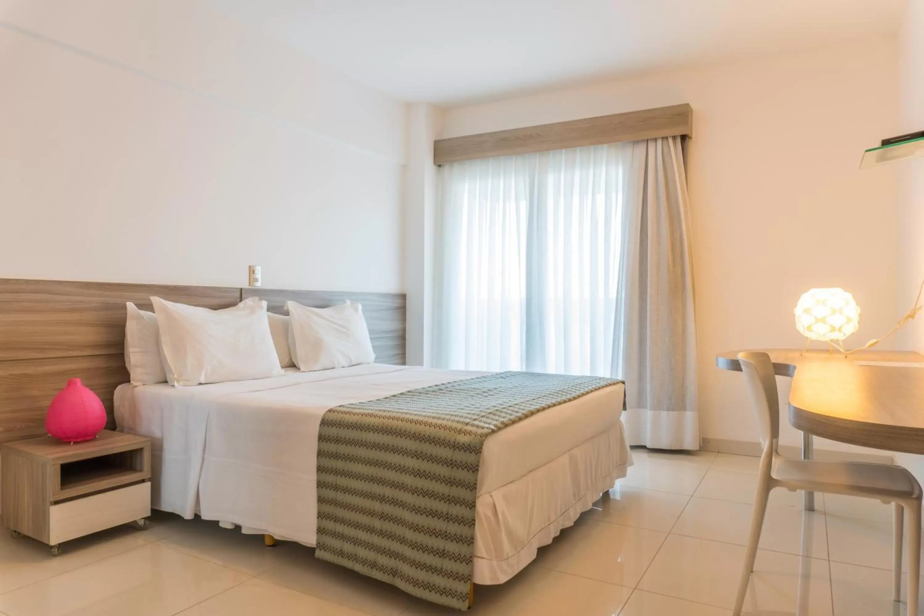 Bed in Kristie Resort Natal Hotel