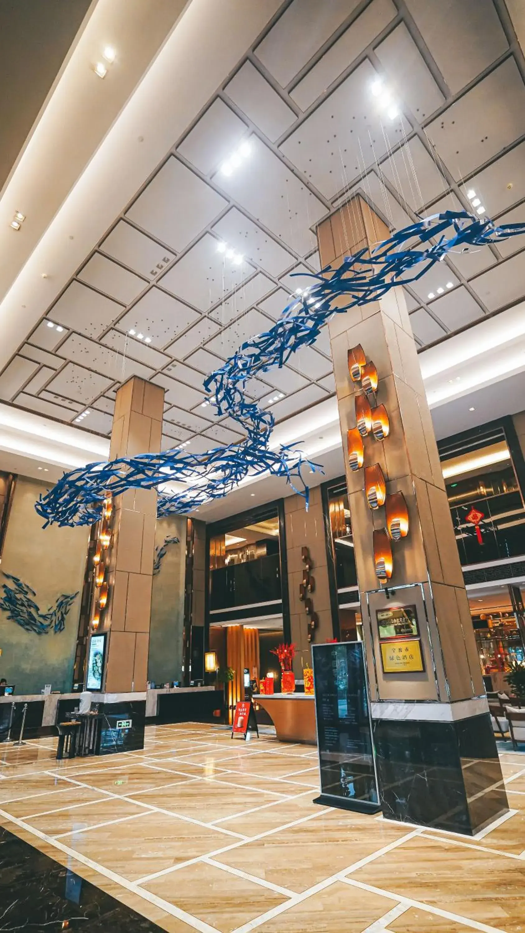 Lobby or reception in DoubleTree By Hilton Ningbo Beilun Lobby or reception in DoubleTree By Hilton Ningbo Beilun