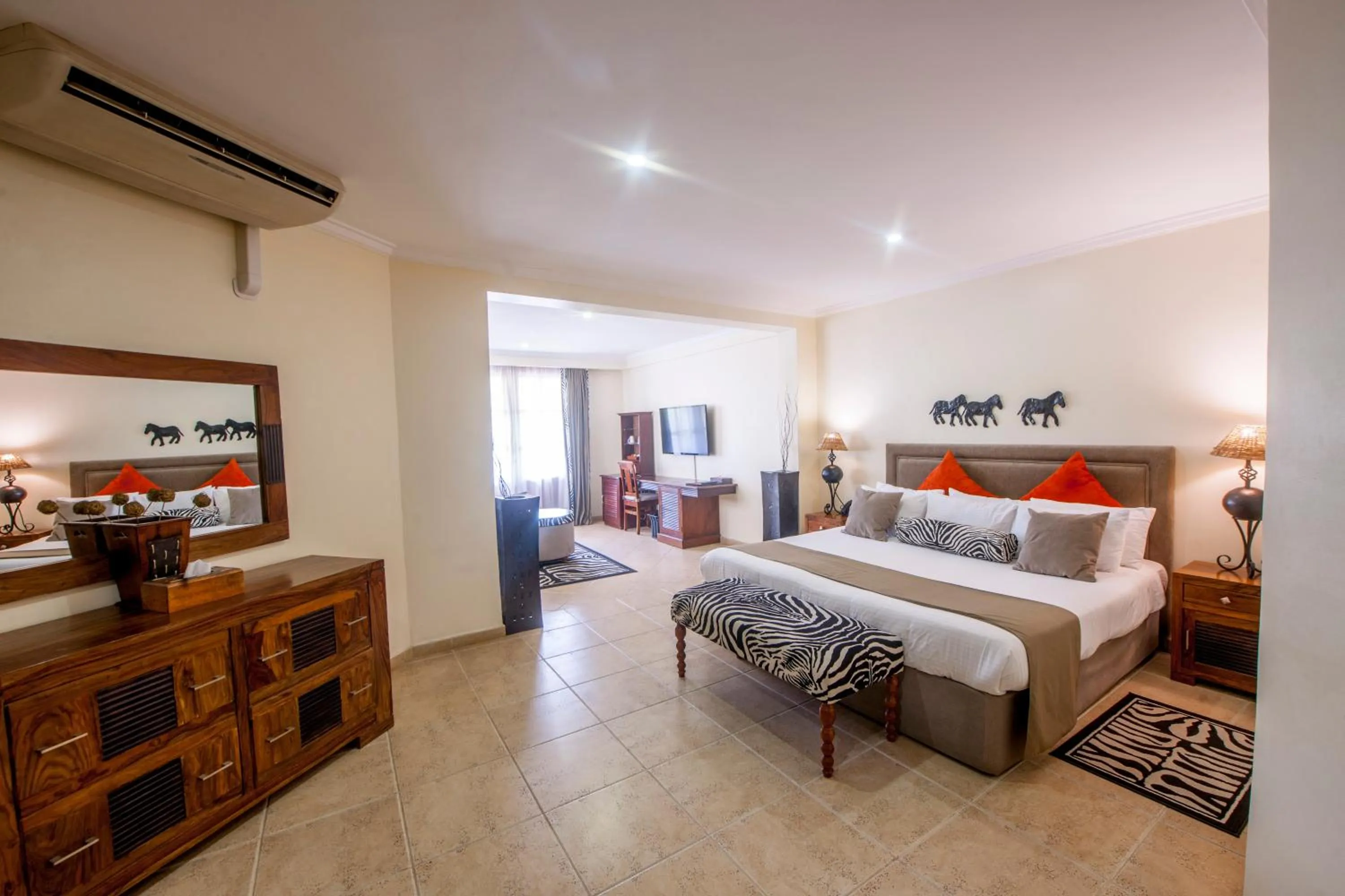 Photo of the whole room, Bed in African Tulip Hotel